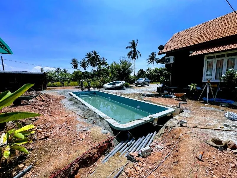 Pool view in HOMESTAY Kampong KOTA AUR Resort with swimming pool, Kepala Batas, SEBERANG PERAI, PENANG -MOTAC registered Awarded ASEAN homestay standard Malaysia AWARD 2023-2028 Only 3 minutes from viral KG AGONG