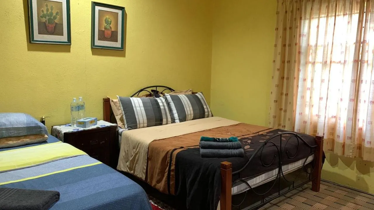 Bed in HOMESTAY Kampong KOTA AUR Resort with swimming pool, Kepala Batas, SEBERANG PERAI, PENANG -MOTAC registered Awarded ASEAN homestay standard Malaysia AWARD 2023-2028 Only 3 minutes from viral KG AGONG