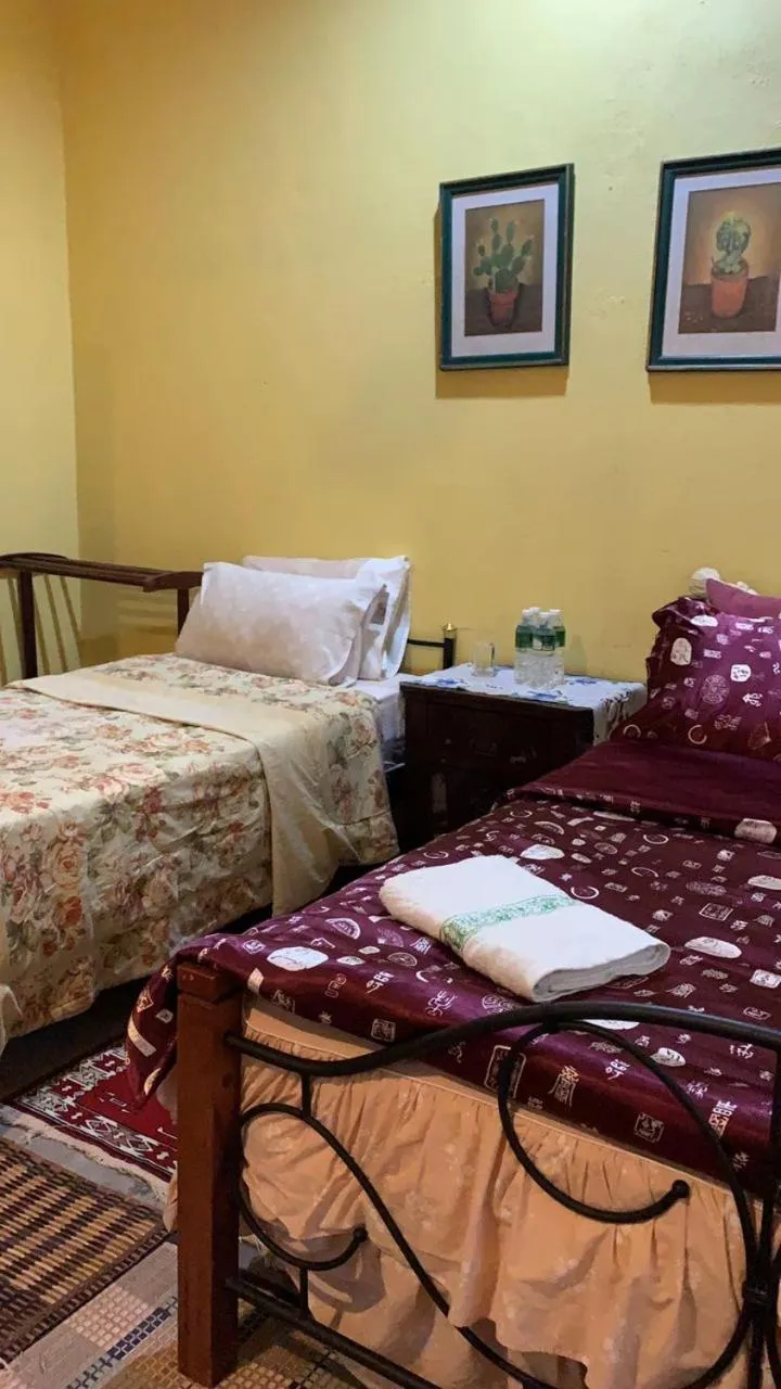 Bed in HOMESTAY Kampong KOTA AUR Resort with swimming pool, Kepala Batas, SEBERANG PERAI, PENANG -MOTAC registered Awarded ASEAN homestay standard Malaysia AWARD 2023-2028 Only 3 minutes from viral KG AGONG