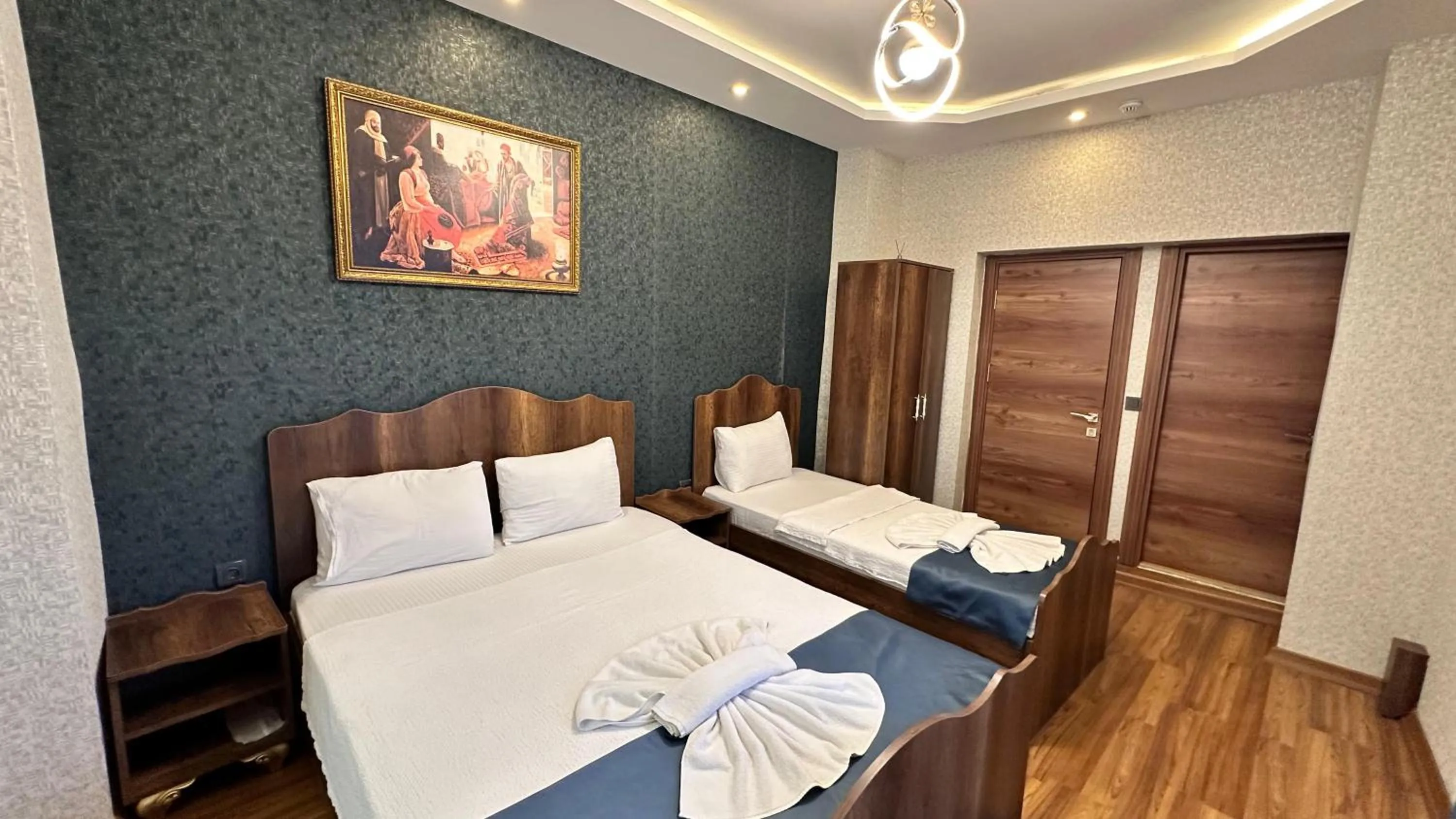 Bed in Aras Boutique Hotel & Suites