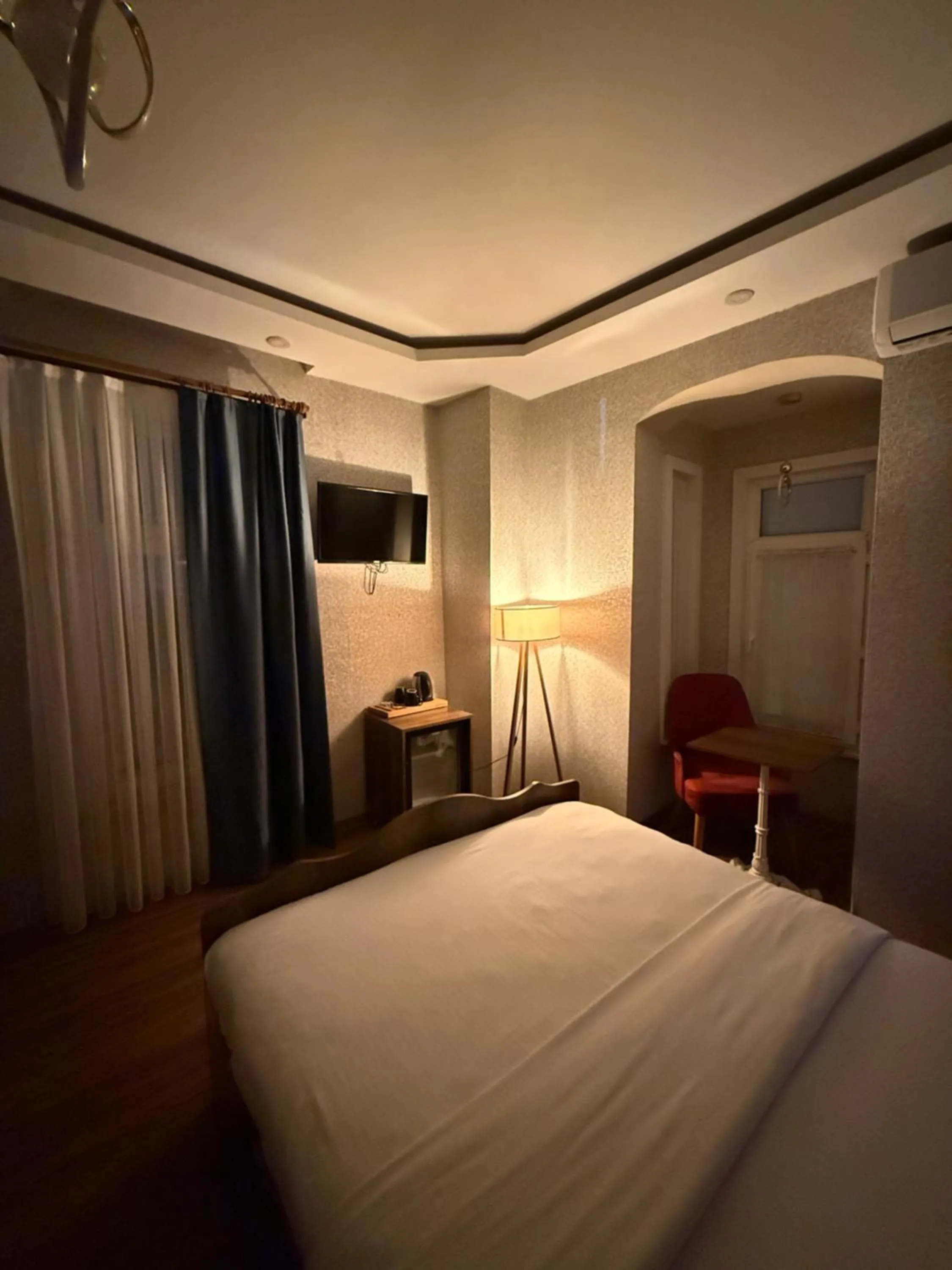 Bed in Aras Boutique Hotel & Suites