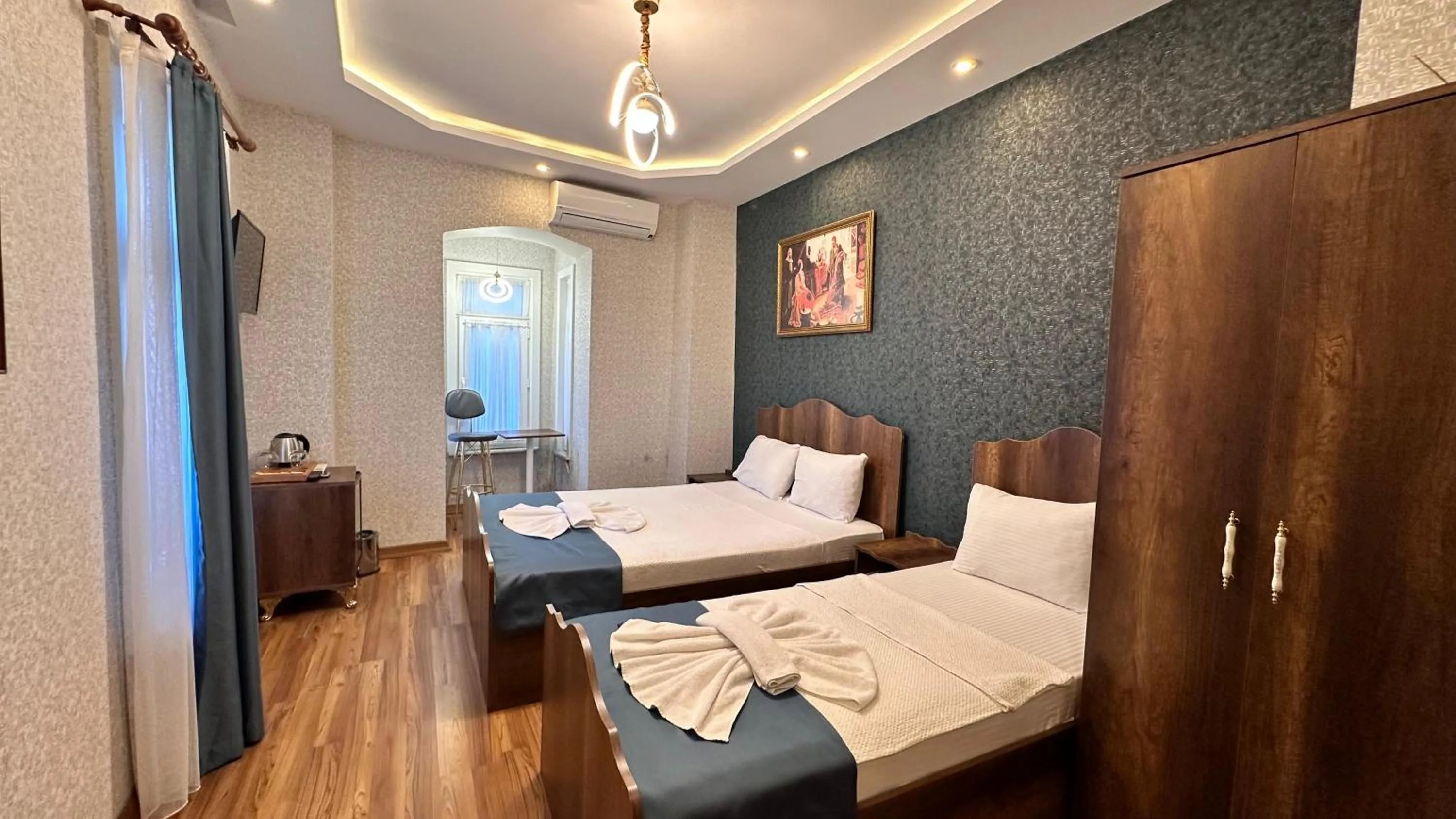 Bed in Aras Boutique Hotel & Suites