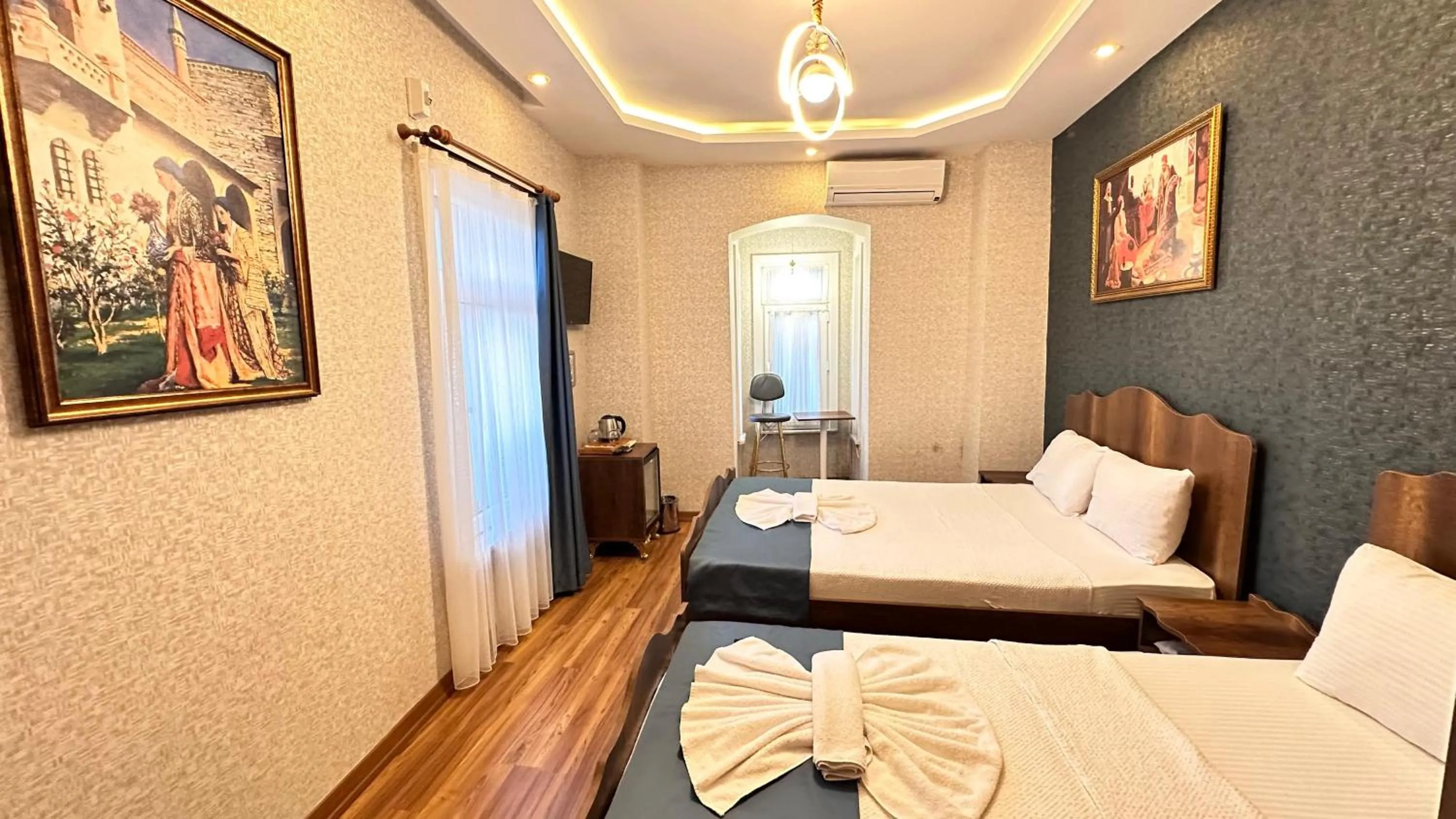 Bed in Aras Boutique Hotel & Suites