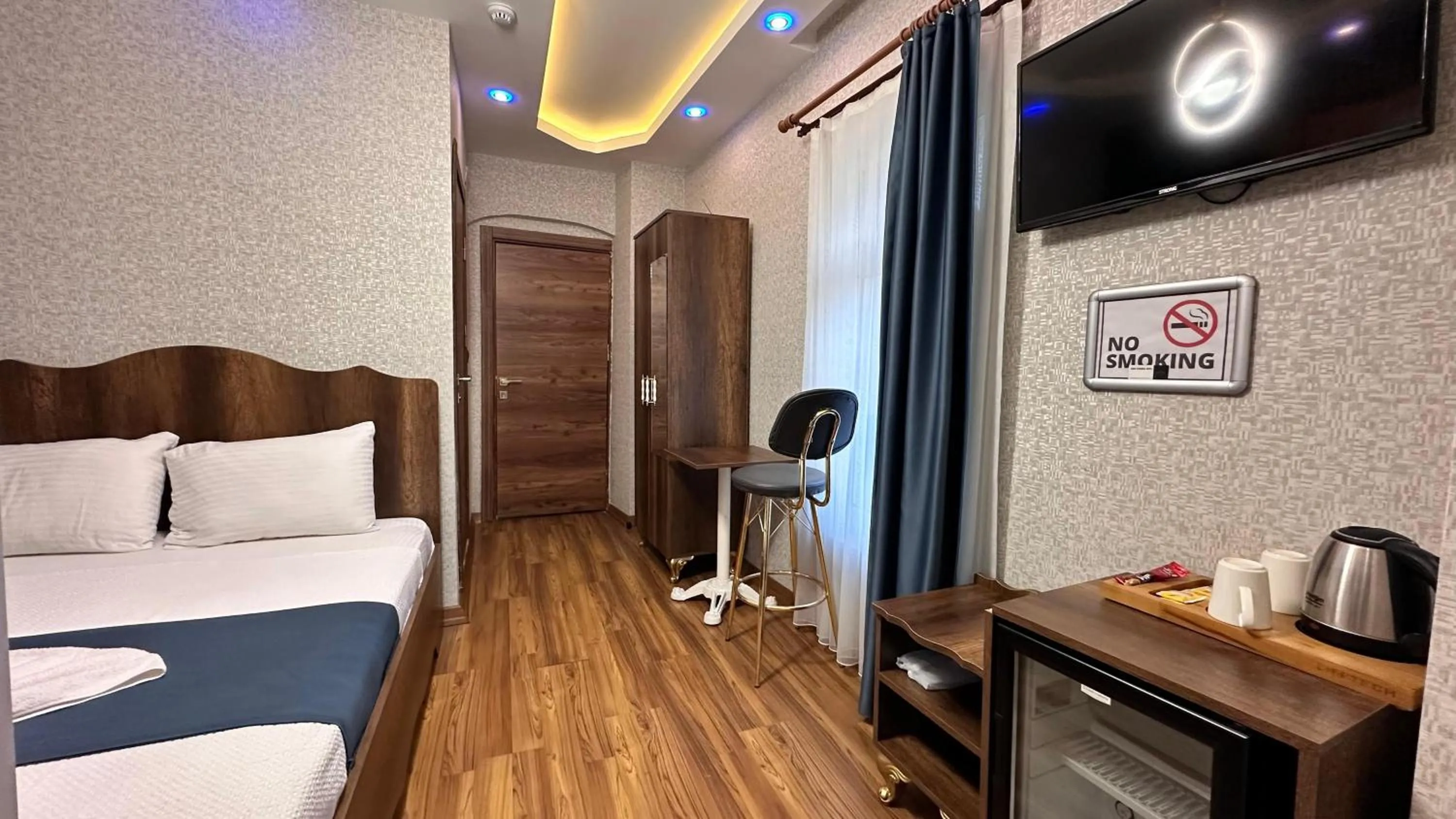 Bed in Aras Boutique Hotel & Suites