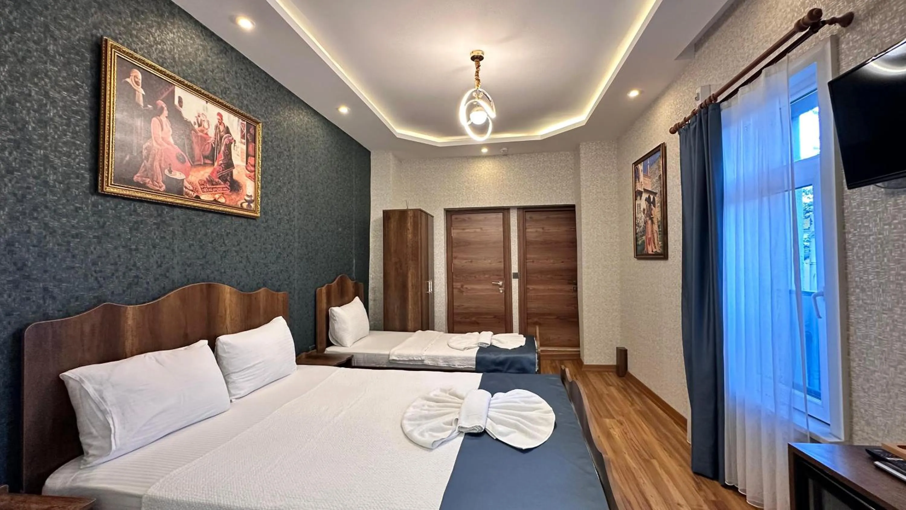 Bed in Aras Boutique Hotel & Suites