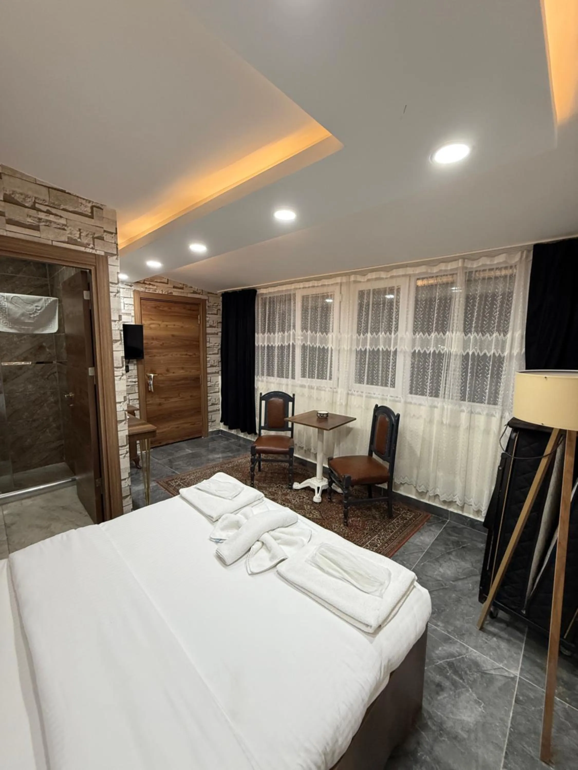 Bed in Aras Boutique Hotel & Suites