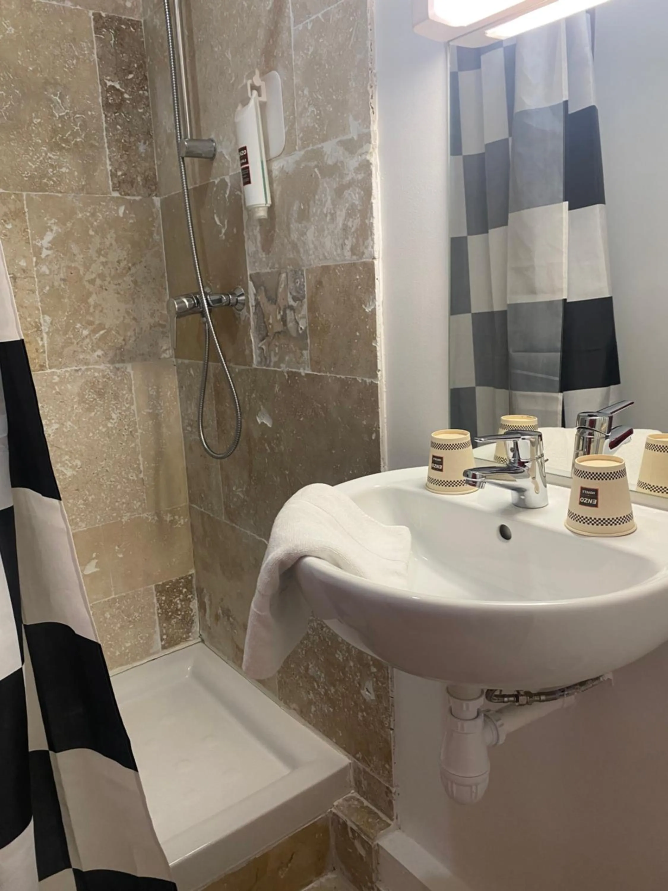 Shower in Enzo Hotels Limoges Centre Jourdan by Kyriad Direct
