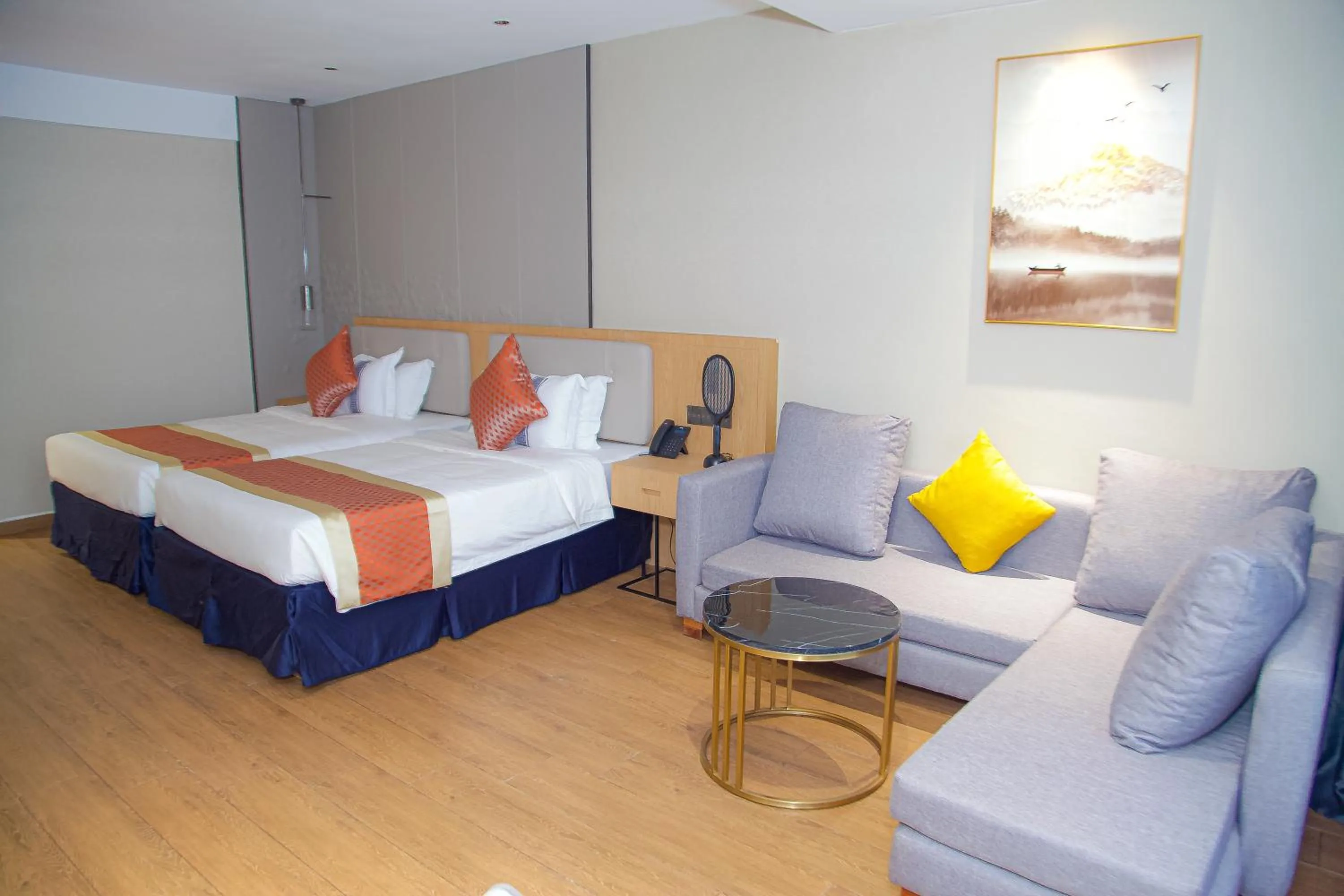 Photo of the whole room in Hôtel FAMILLE MONDIALE