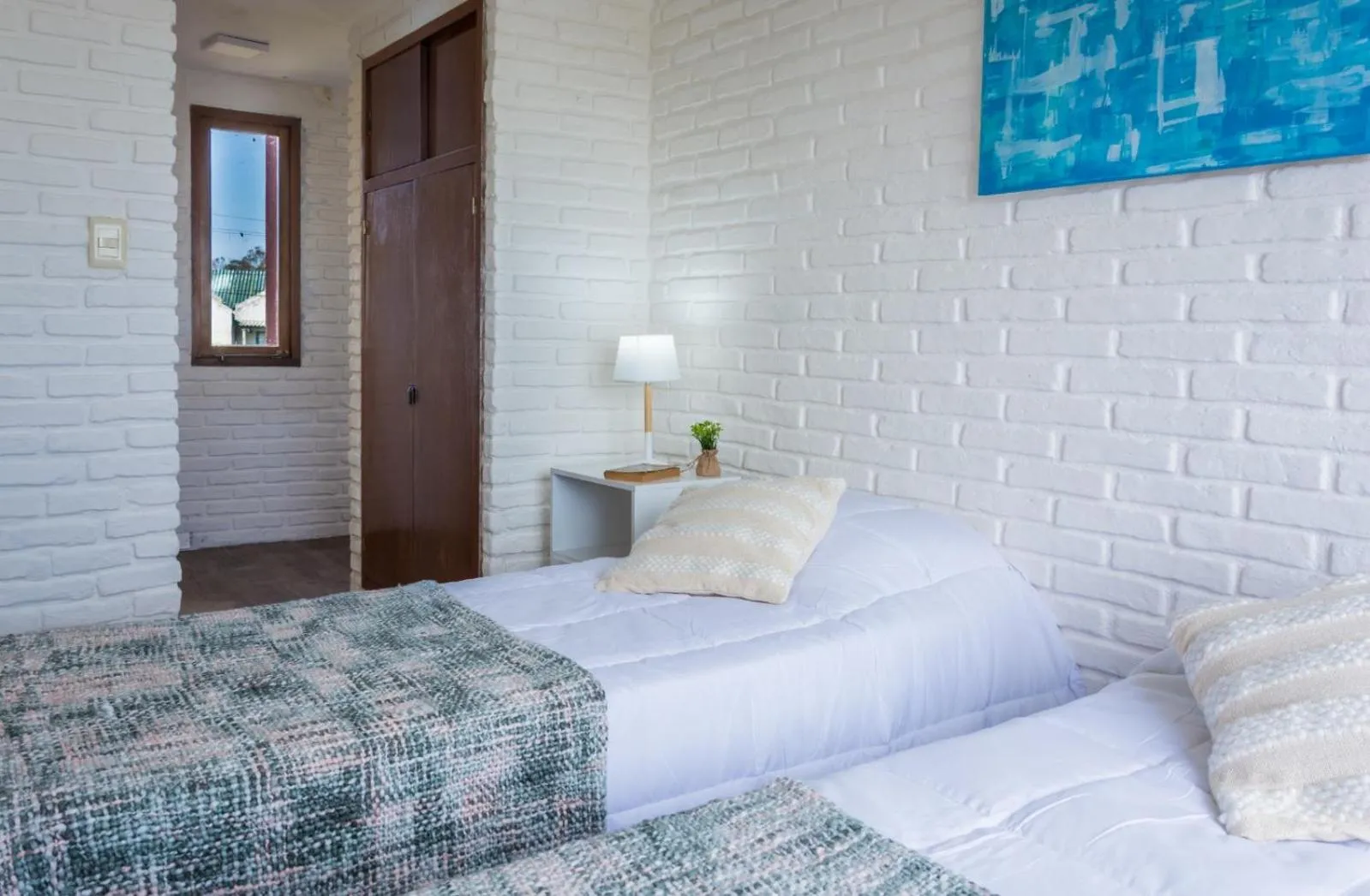 Bed in Portobello Suites Hotel