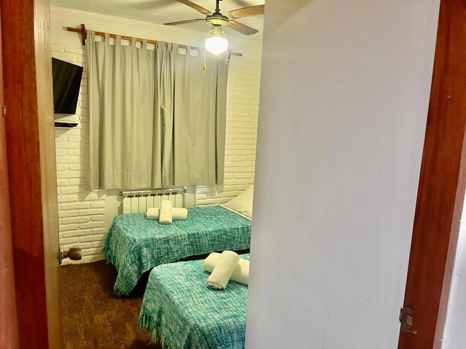 Bed in Portobello Suites Hotel