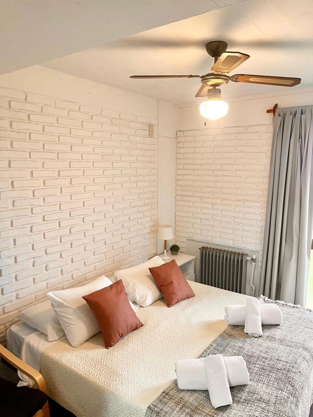 Bed in Portobello Suites Hotel