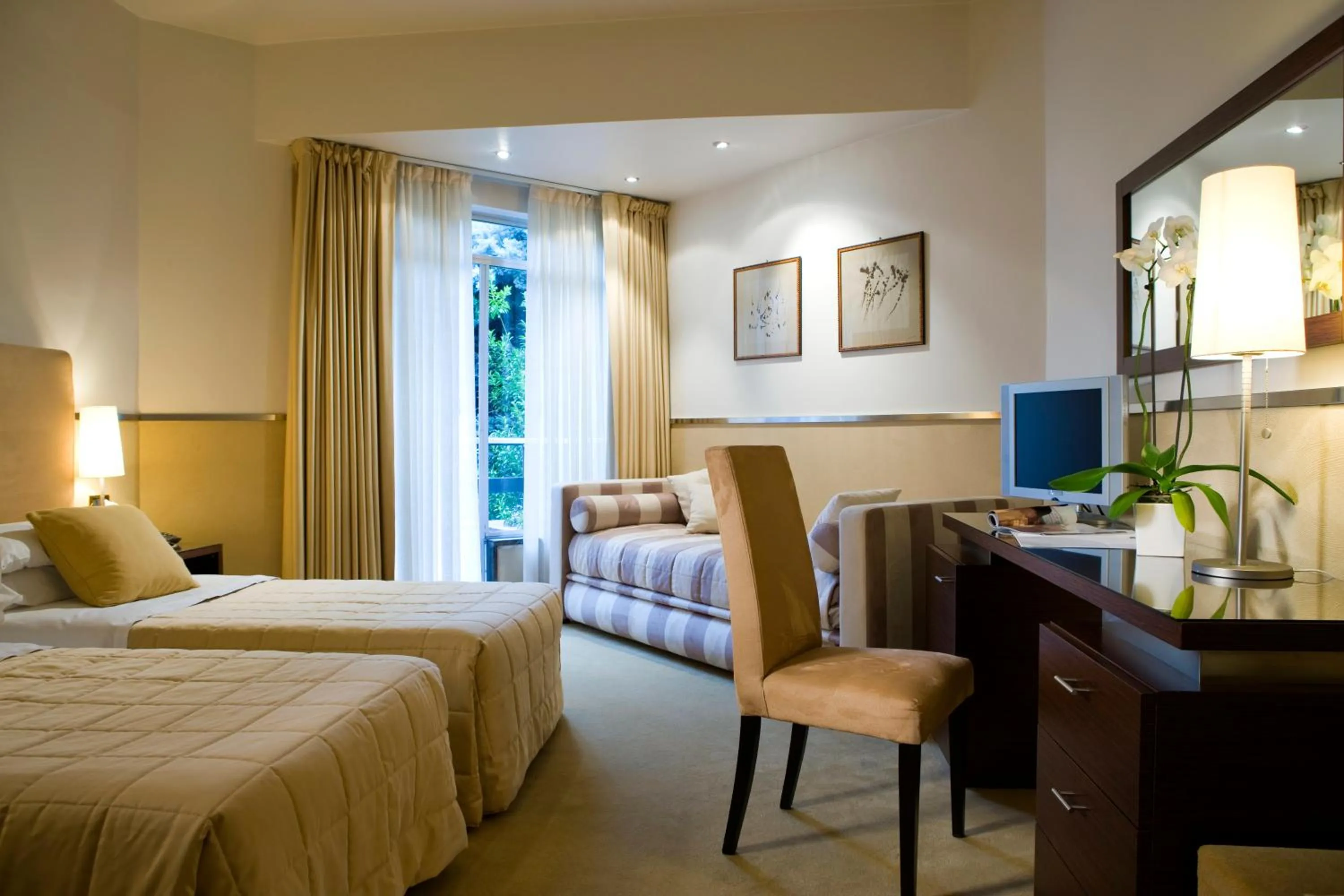 Bed in Mini Palace Hotel