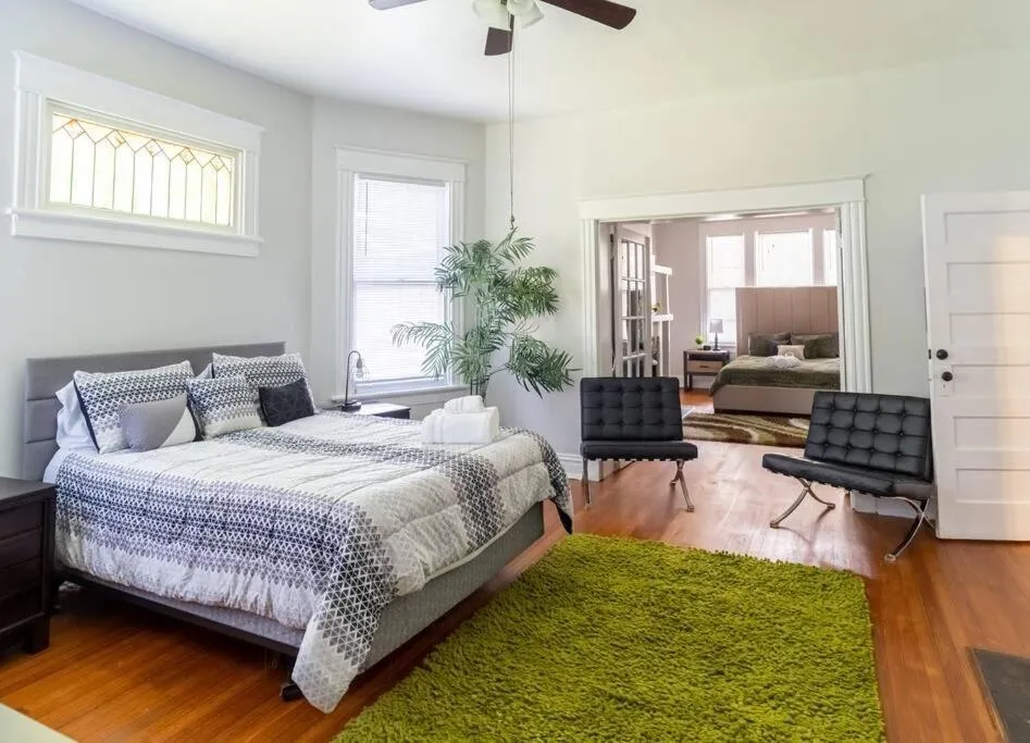 Bed in The Great Pink Lady with Huge Wrap Around Porch!