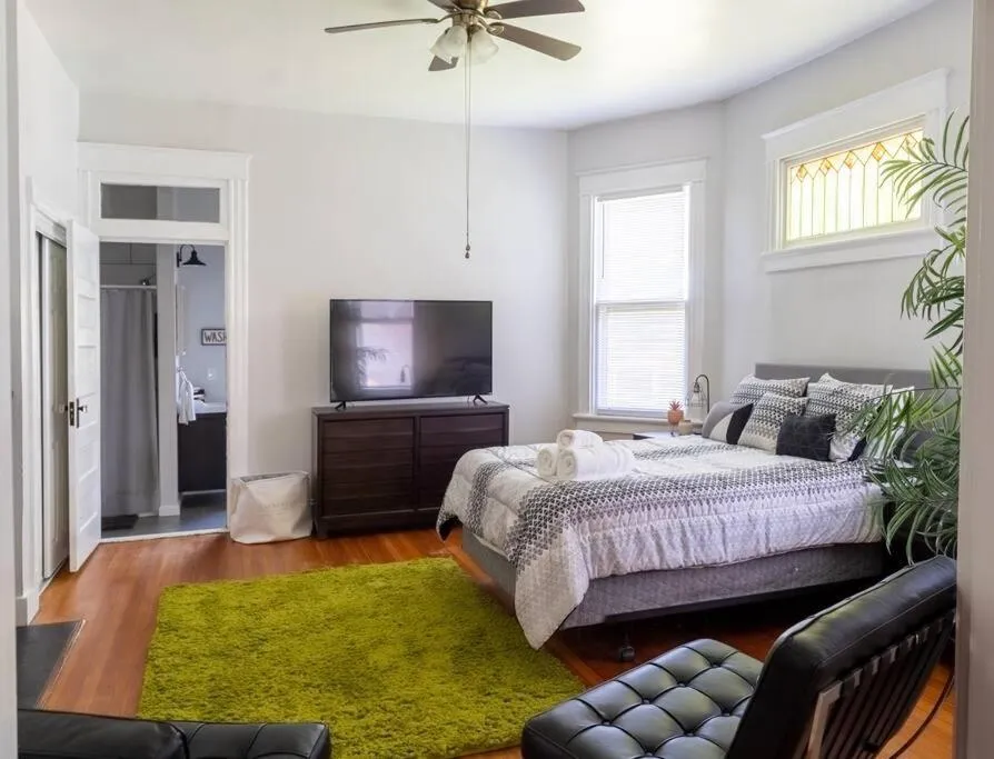 Bed in The Great Pink Lady with Huge Wrap Around Porch!