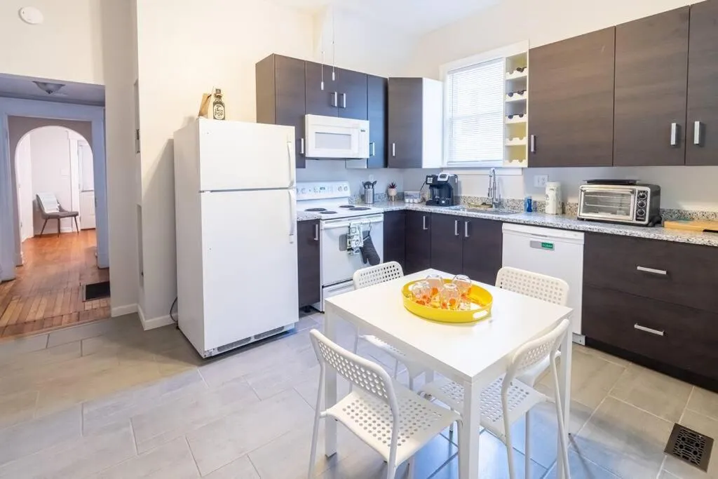 Kitchen or kitchenette in The Great Pink Lady with Huge Wrap Around Porch!