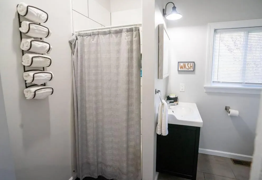 Shower in The Great Pink Lady with Huge Wrap Around Porch!