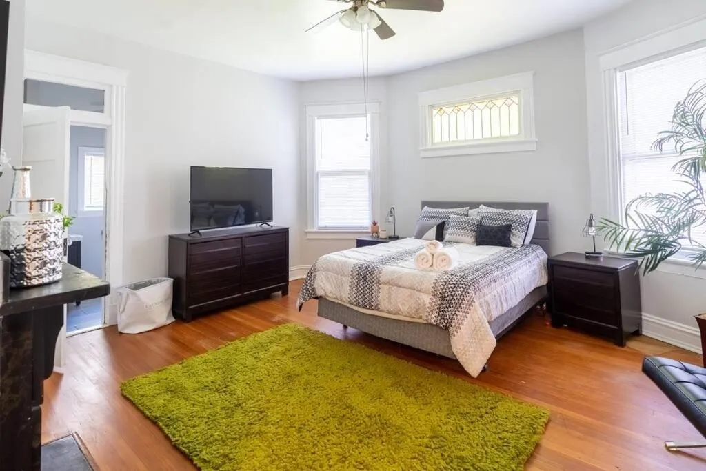 Bed in The Great Pink Lady with Huge Wrap Around Porch!