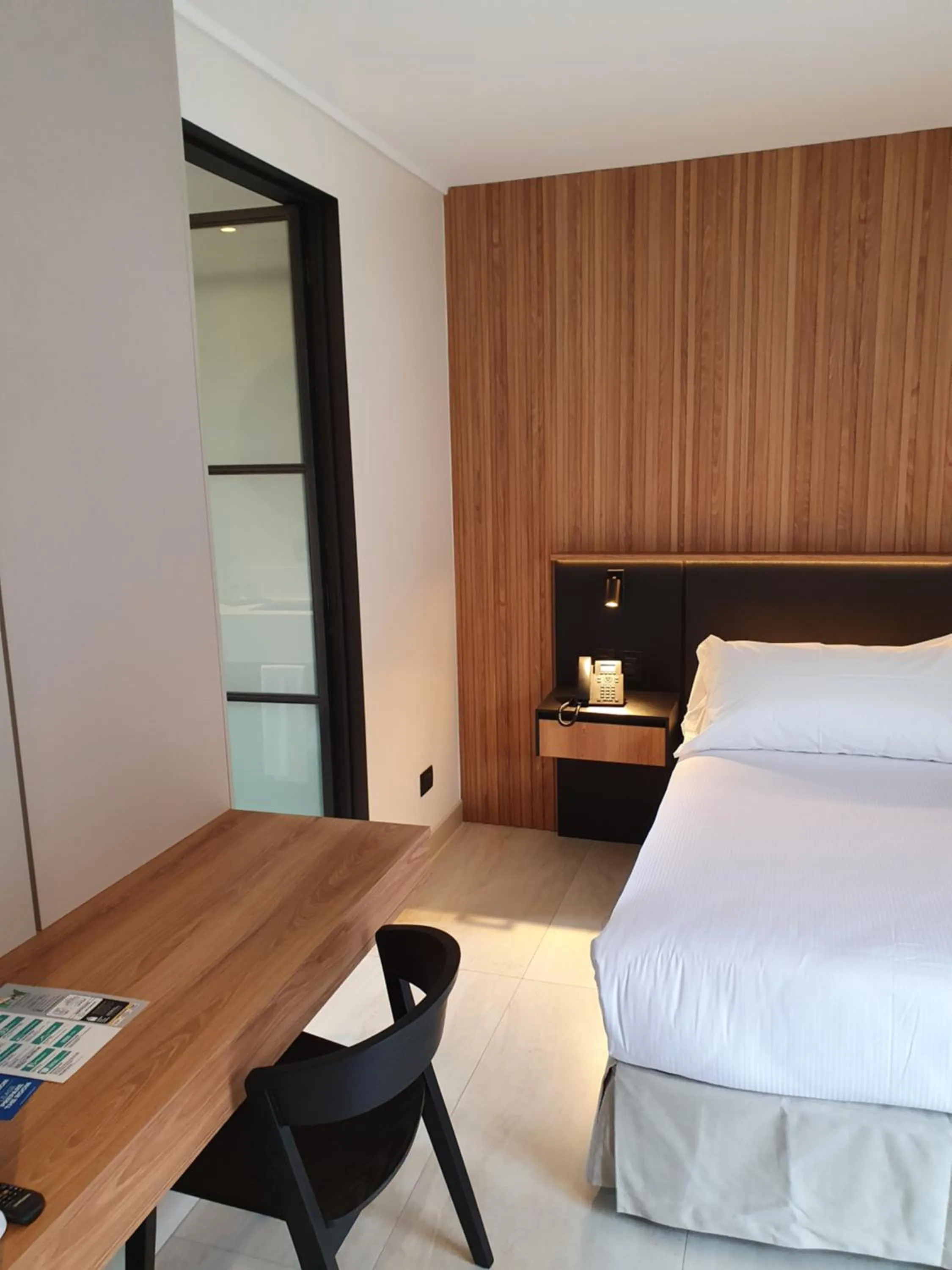 Seating area, Bed in Lastarria Hotel