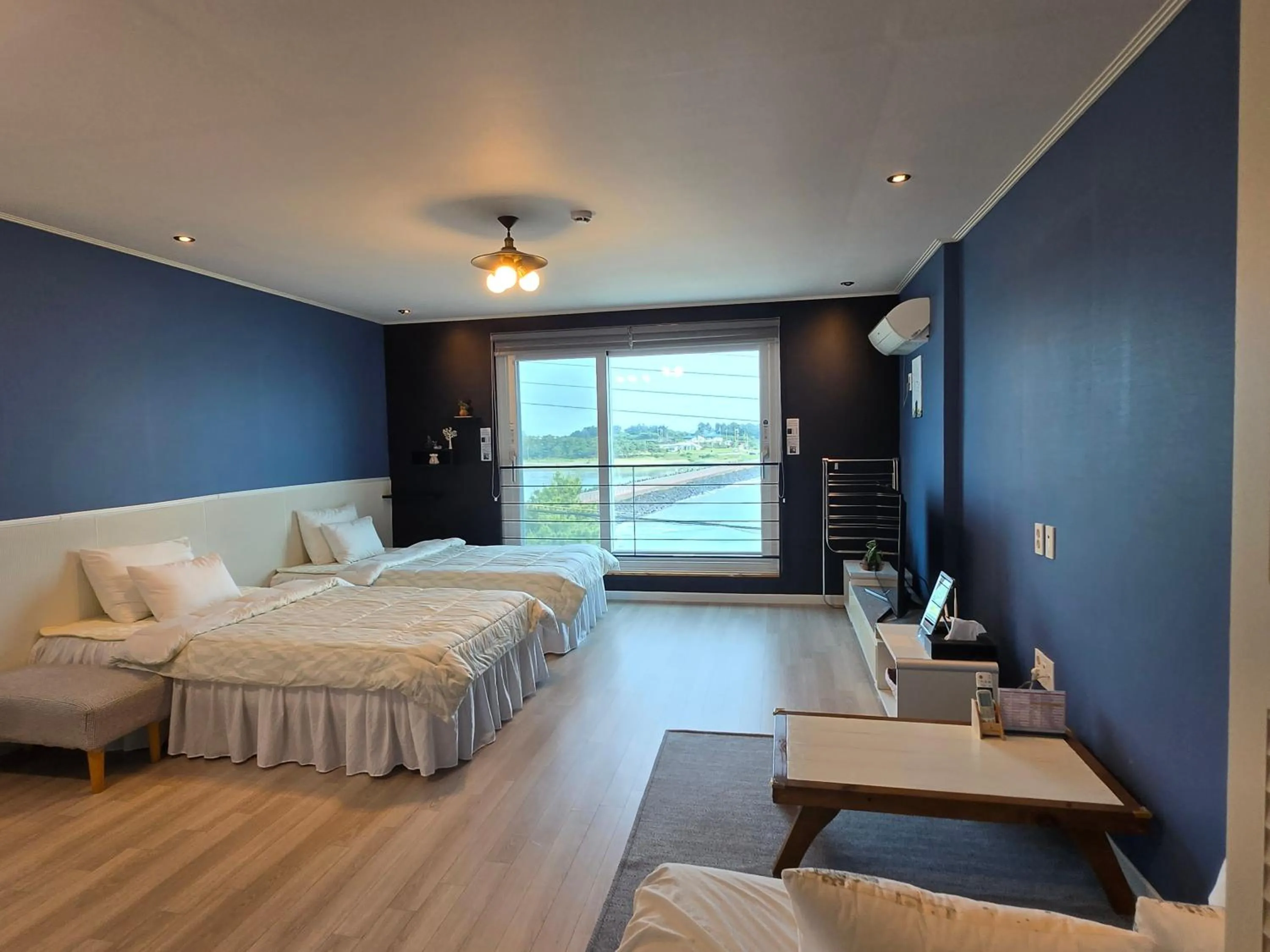 Bed in Jeju Gaviota Pension