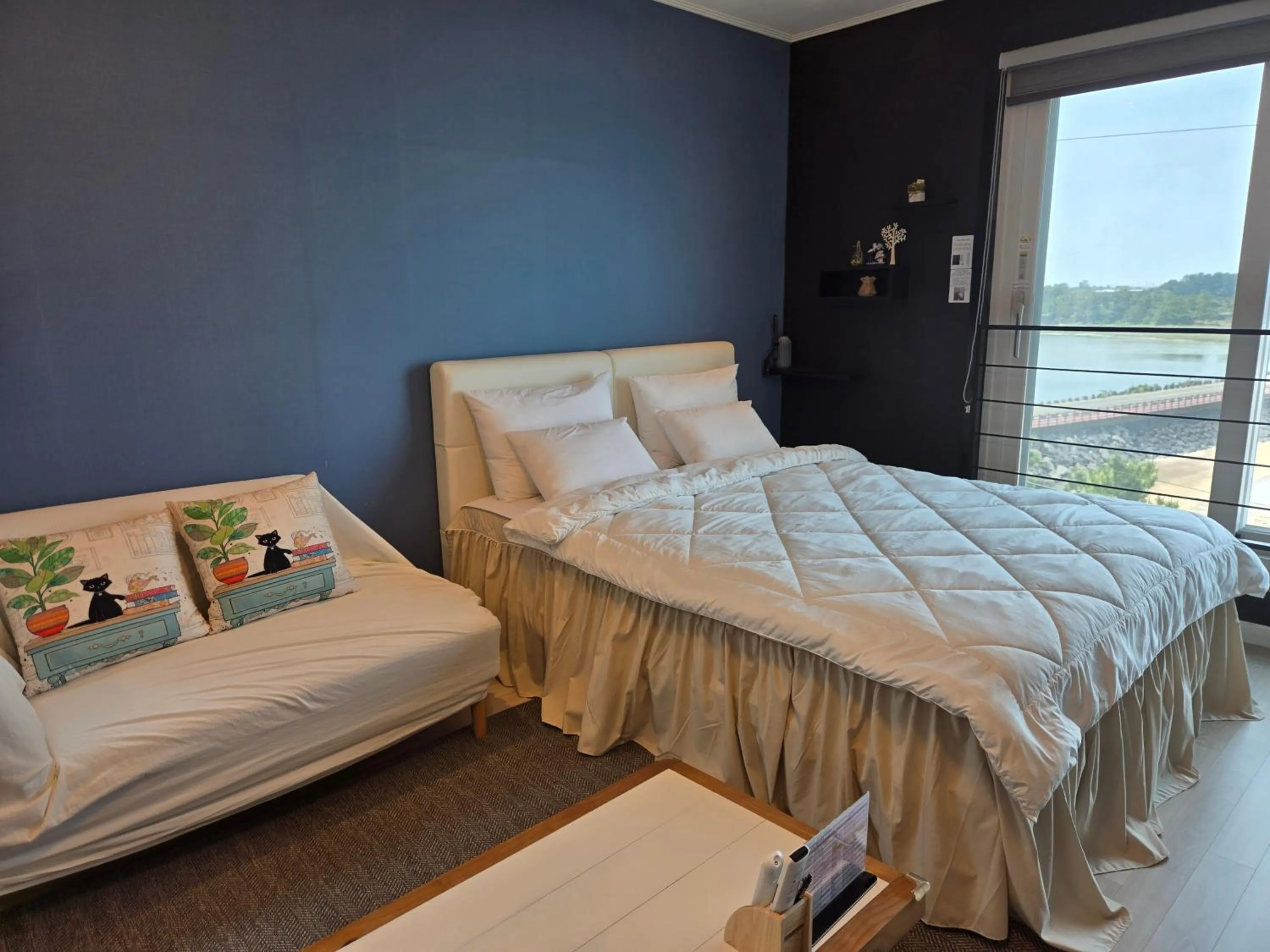 Bed in Jeju Gaviota Pension