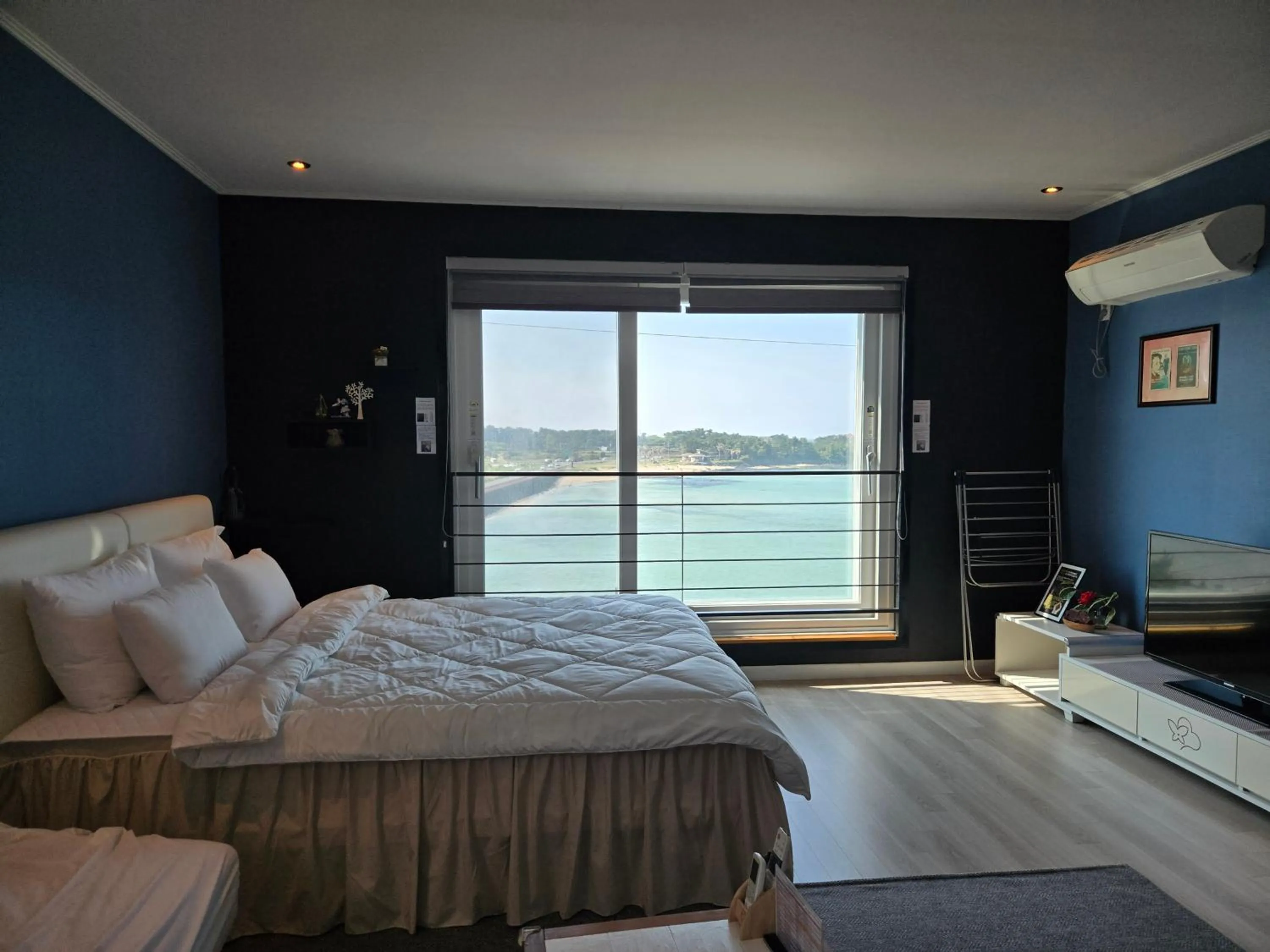 Bed in Jeju Gaviota Pension