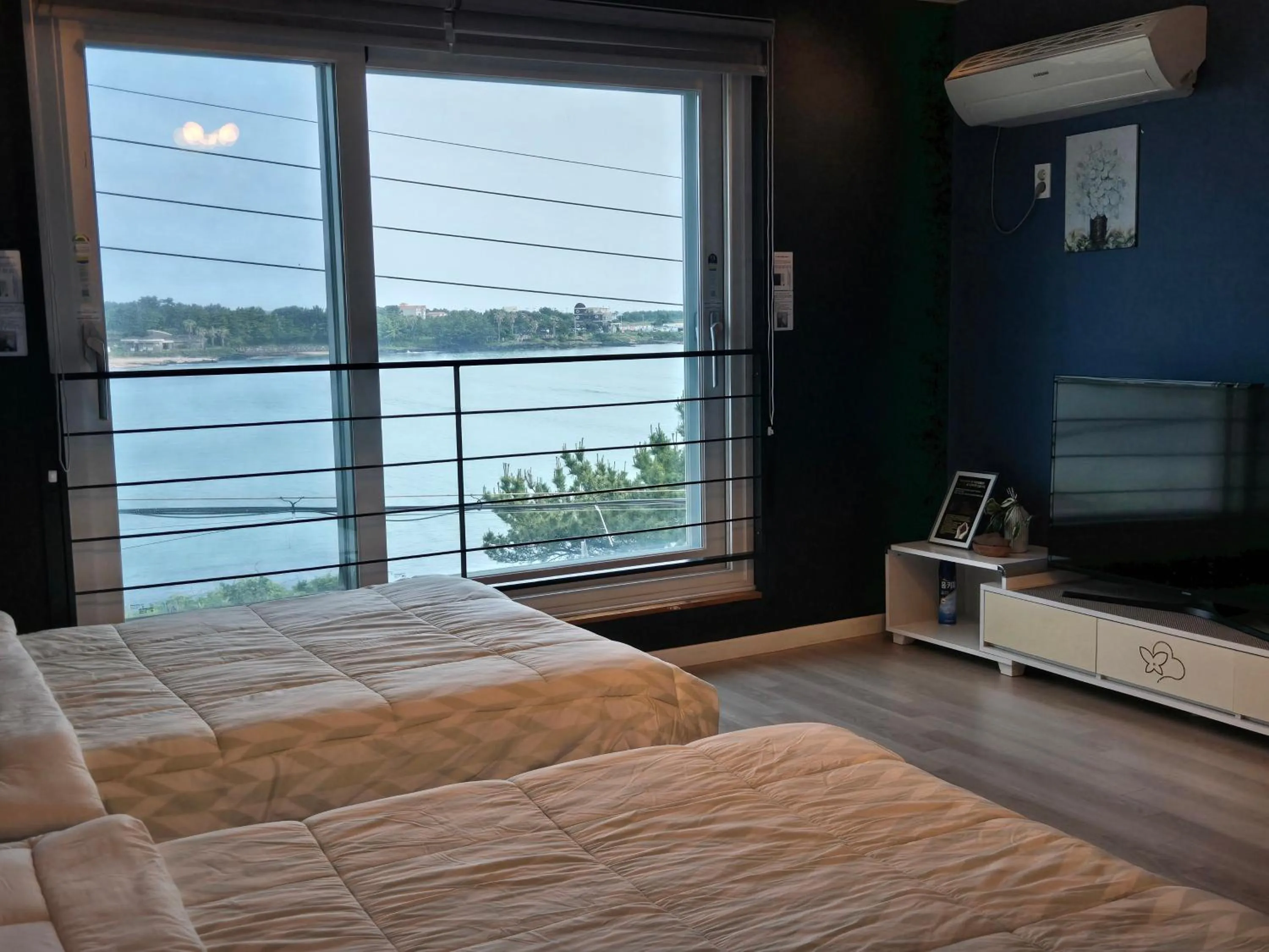 Bed in Jeju Gaviota Pension