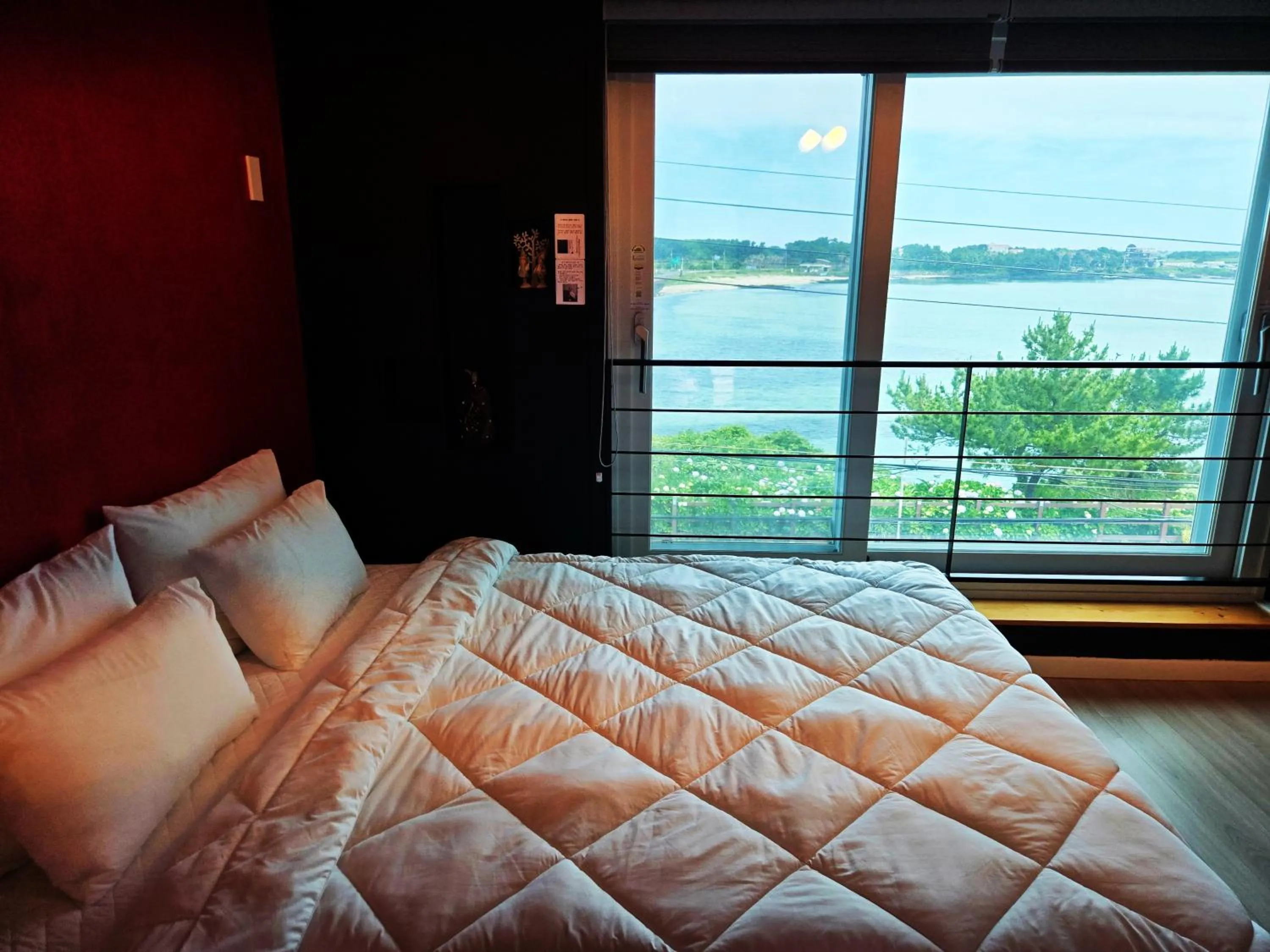 Bed in Jeju Gaviota Pension