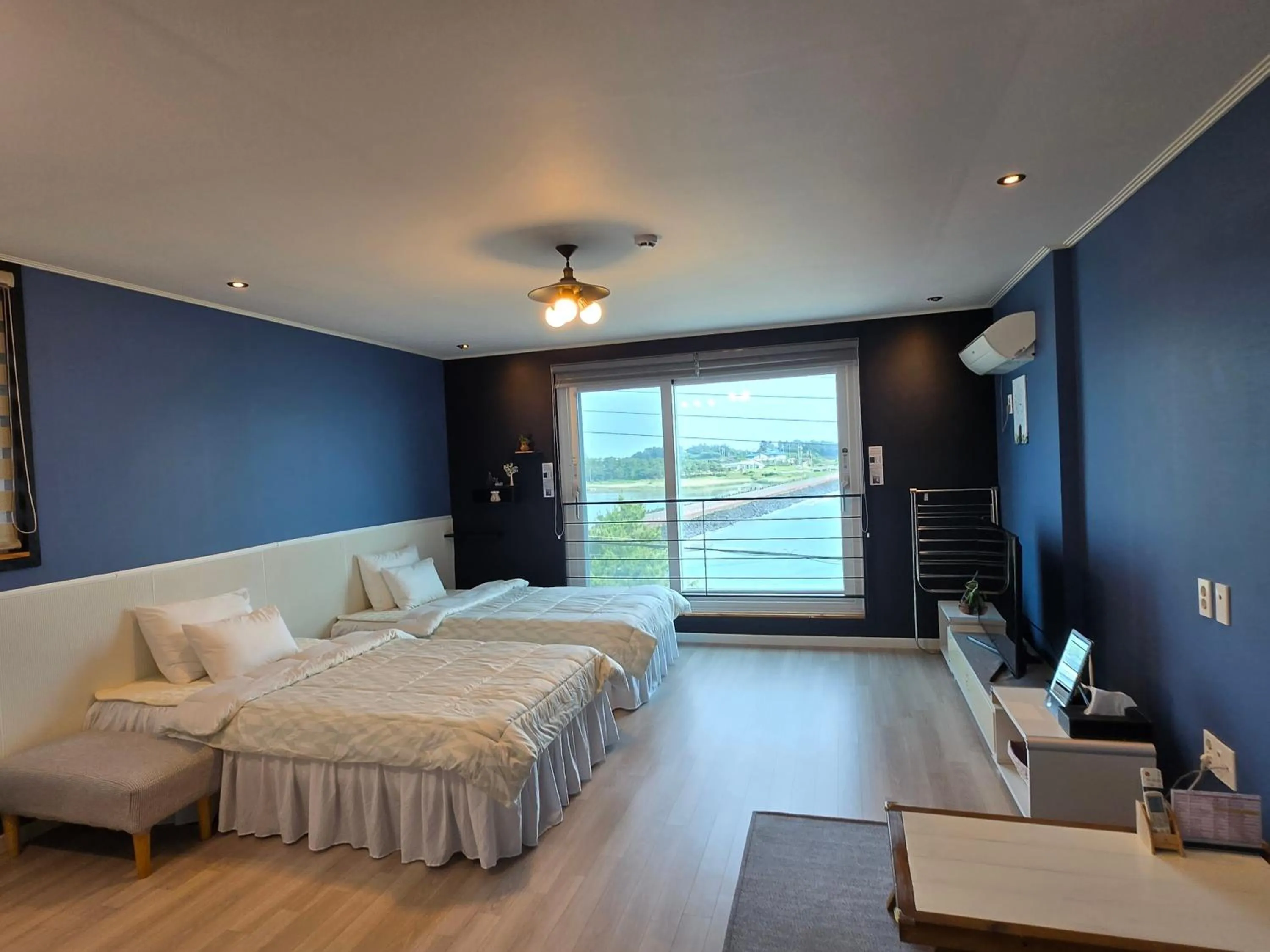 Bed in Jeju Gaviota Pension