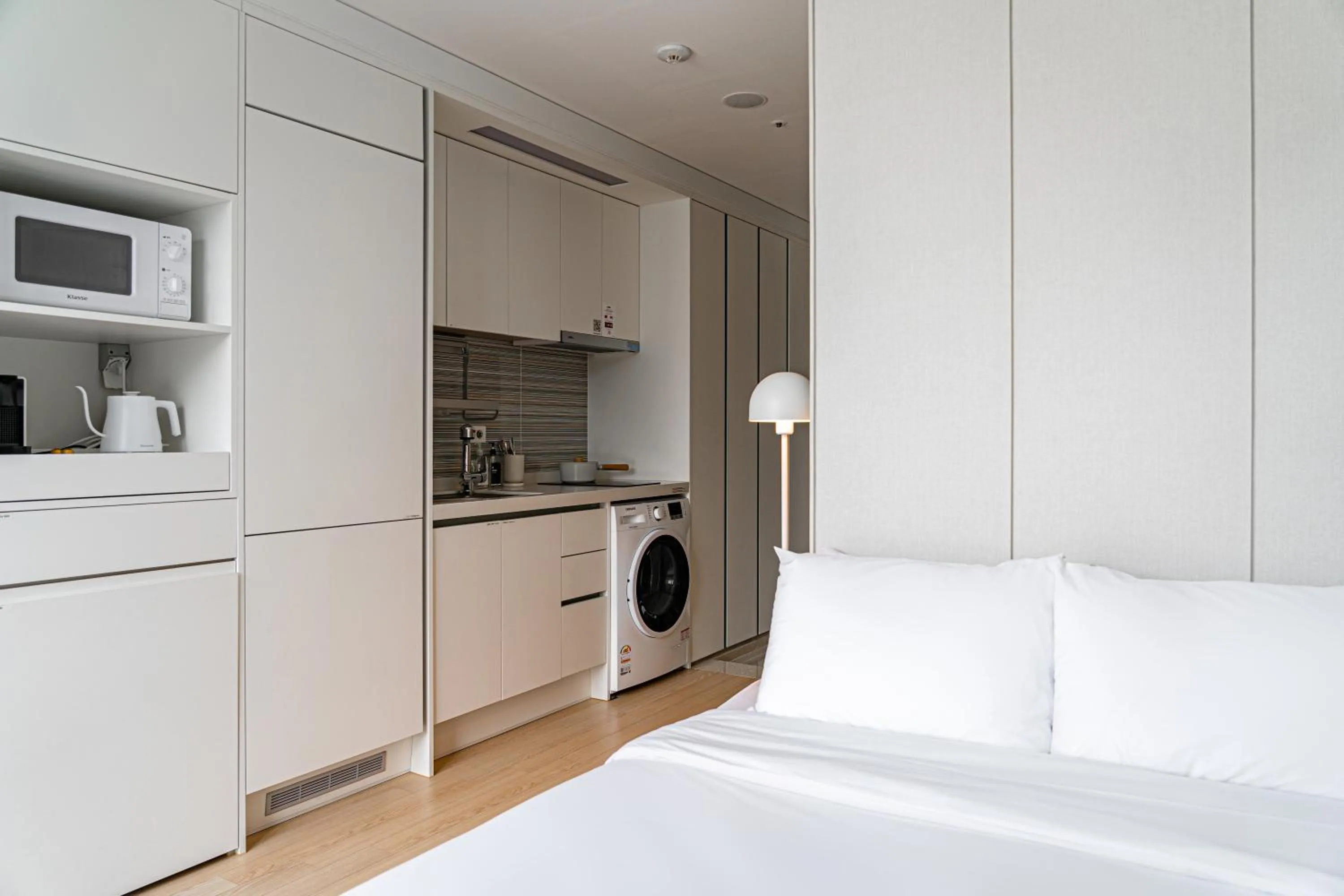 Kitchen or kitchenette, Bed in Urbanstay Myeongdong