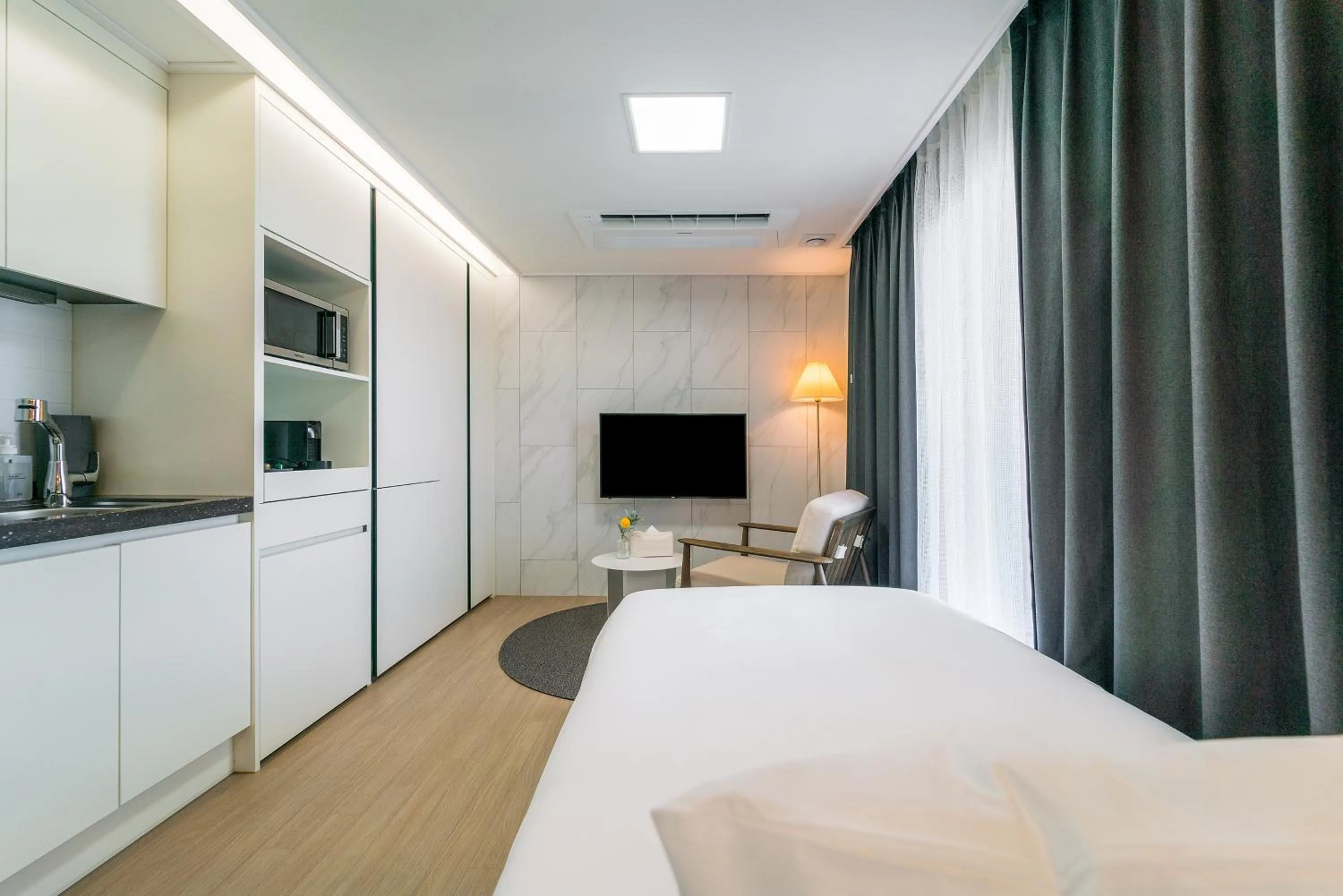 Bed in Urbanstay Jeju Airport