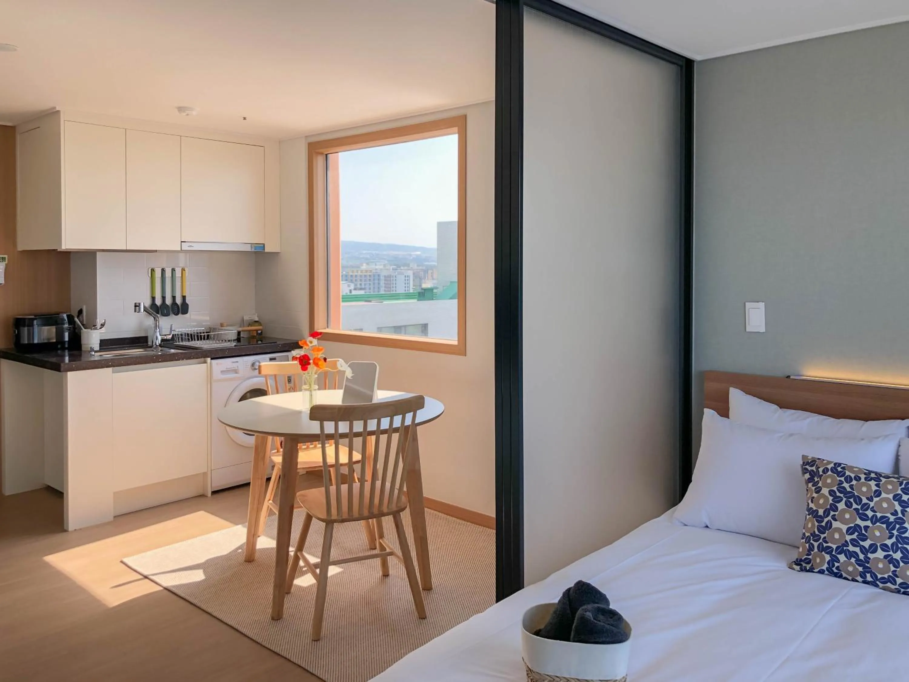 Bed in Urbanstay Jeju Airport