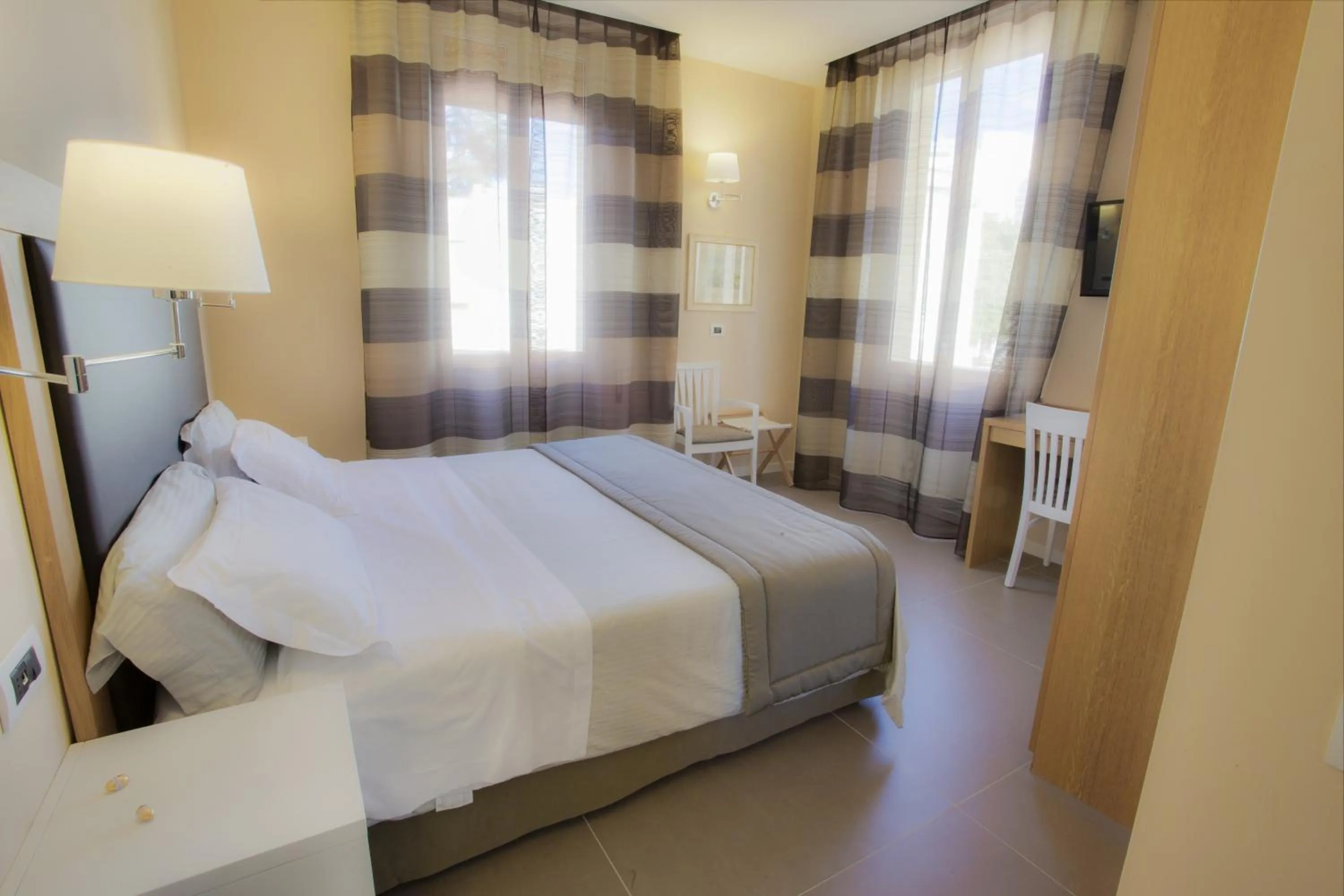 Bed in Relais Le Felci Executive Suite Spa