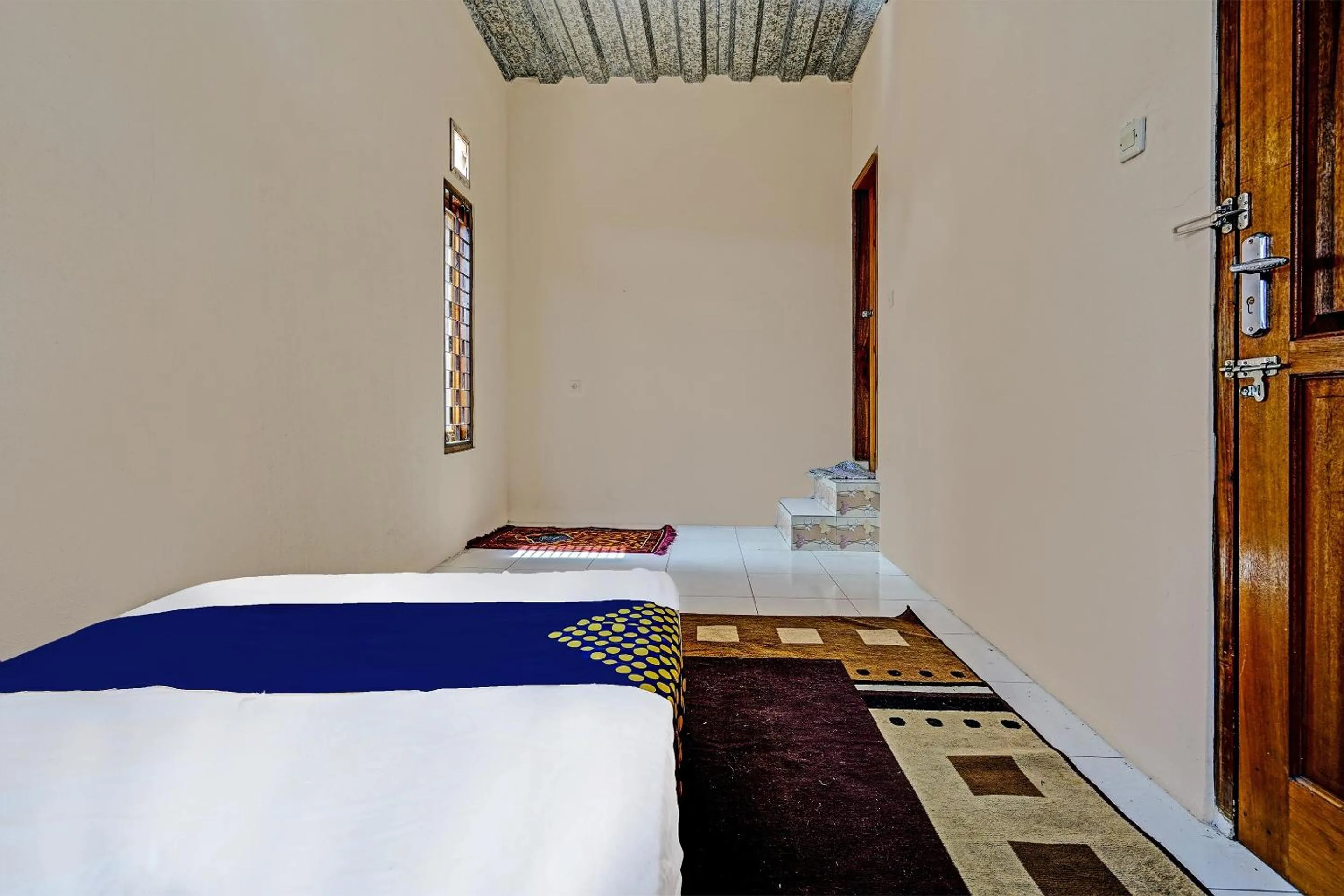 Bedroom in SPOT ON 91468 Pondok Shofa Mc Syariah