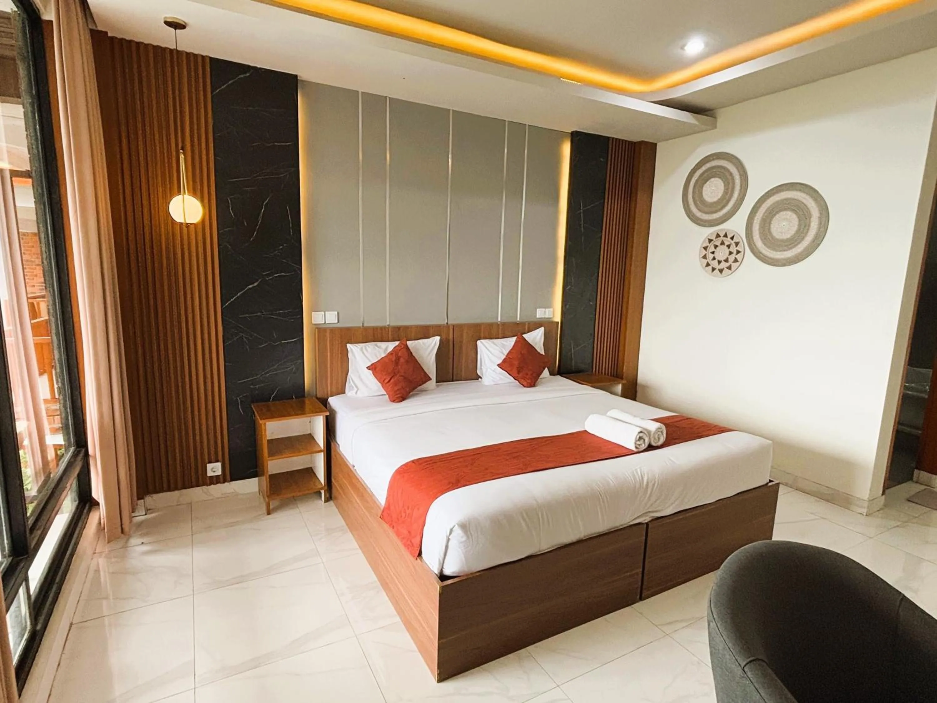 Bed in Caldera Hotel & Restaurant