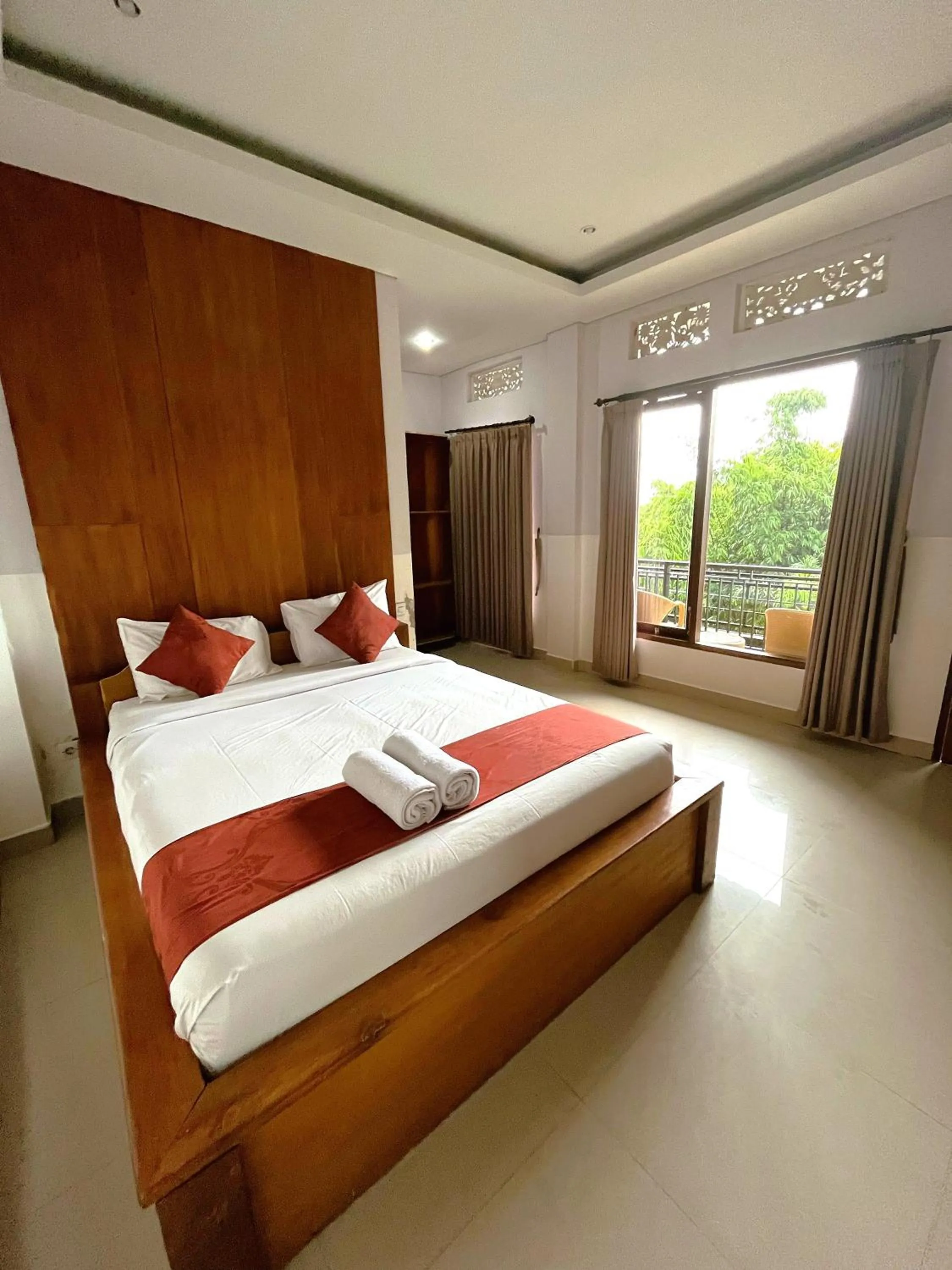 Bed in Caldera Hotel & Restaurant