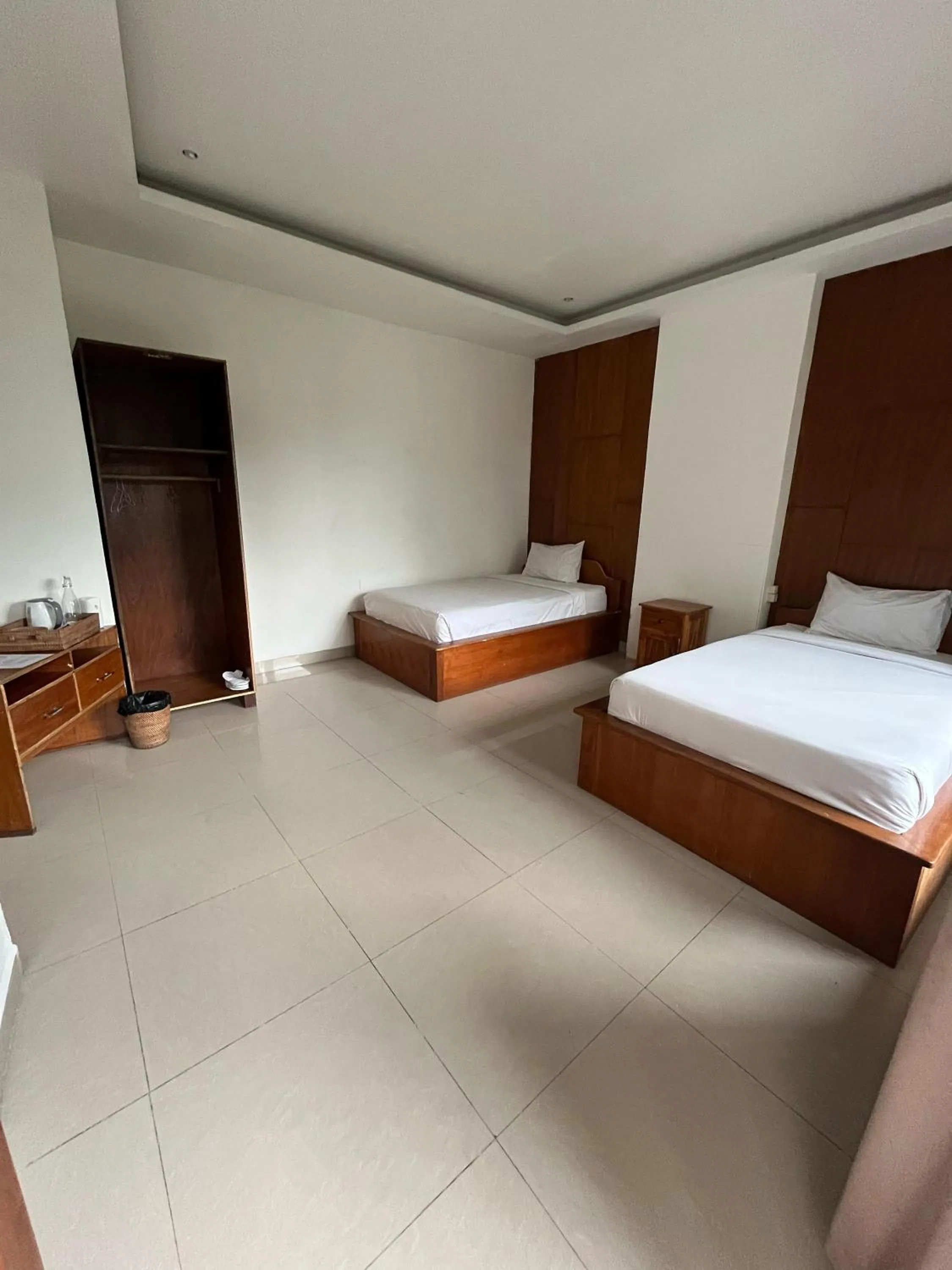 Bed in Caldera Hotel & Restaurant