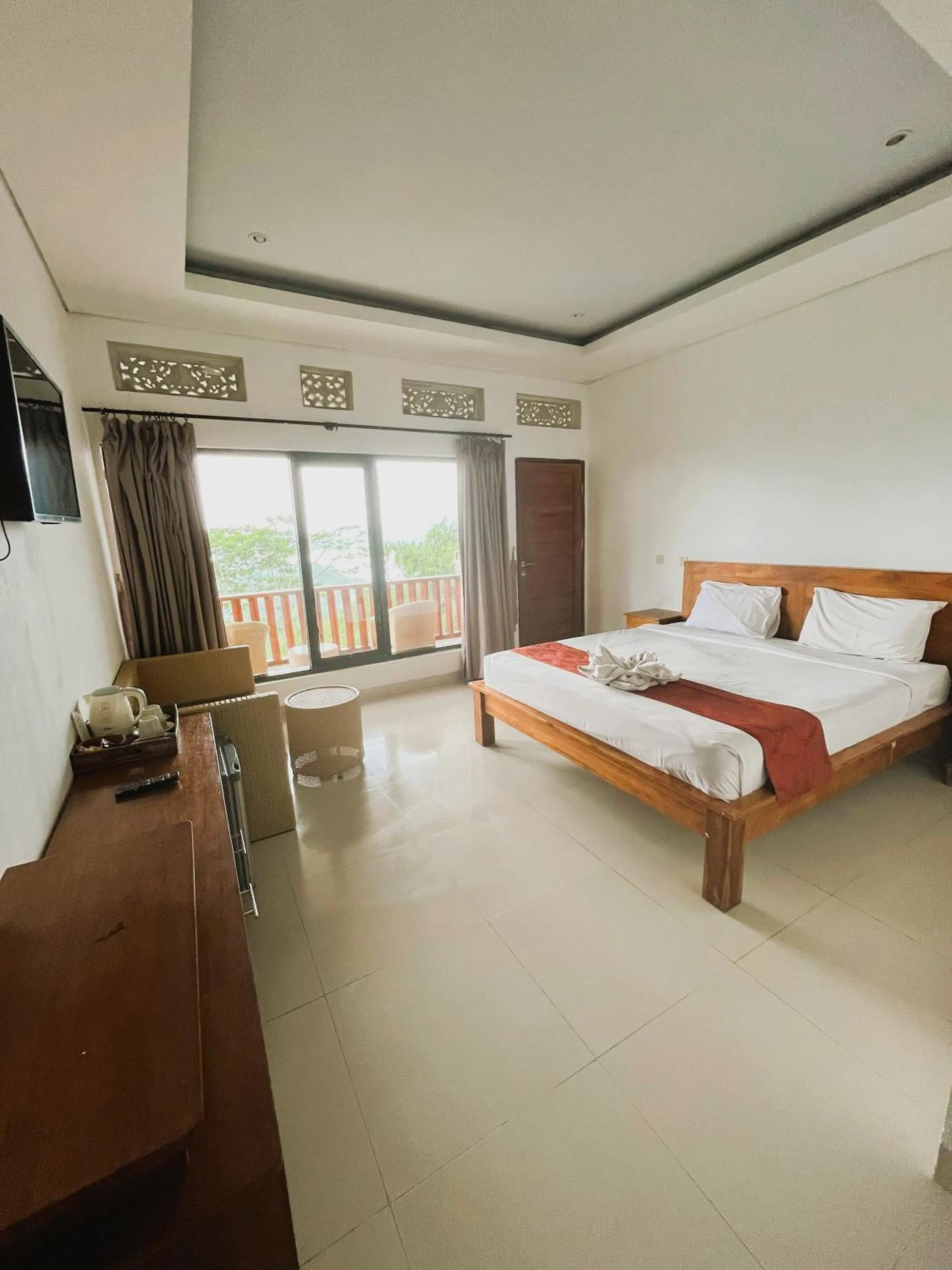 Bed in Caldera Hotel & Restaurant