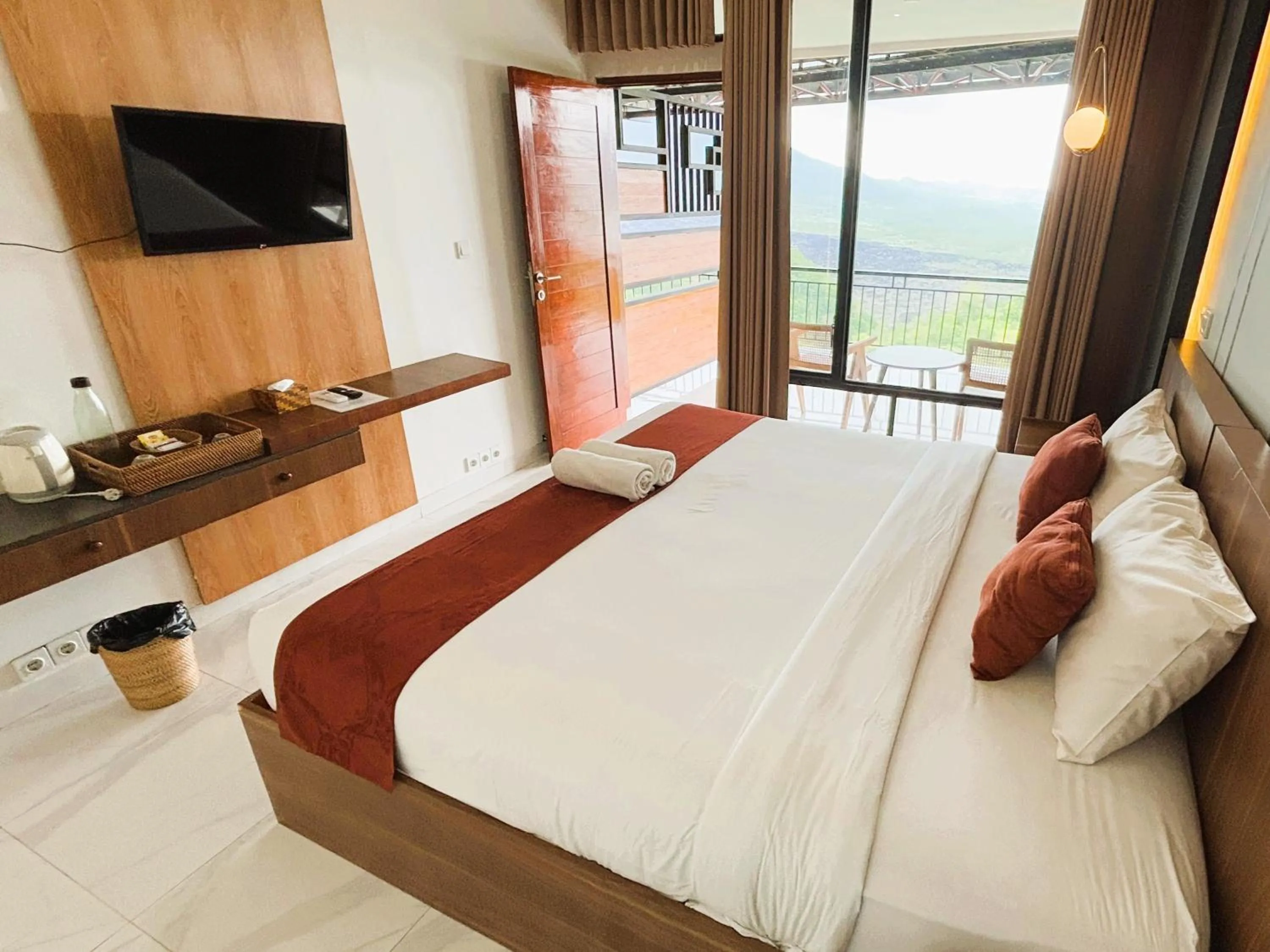 Bed in Caldera Hotel & Restaurant