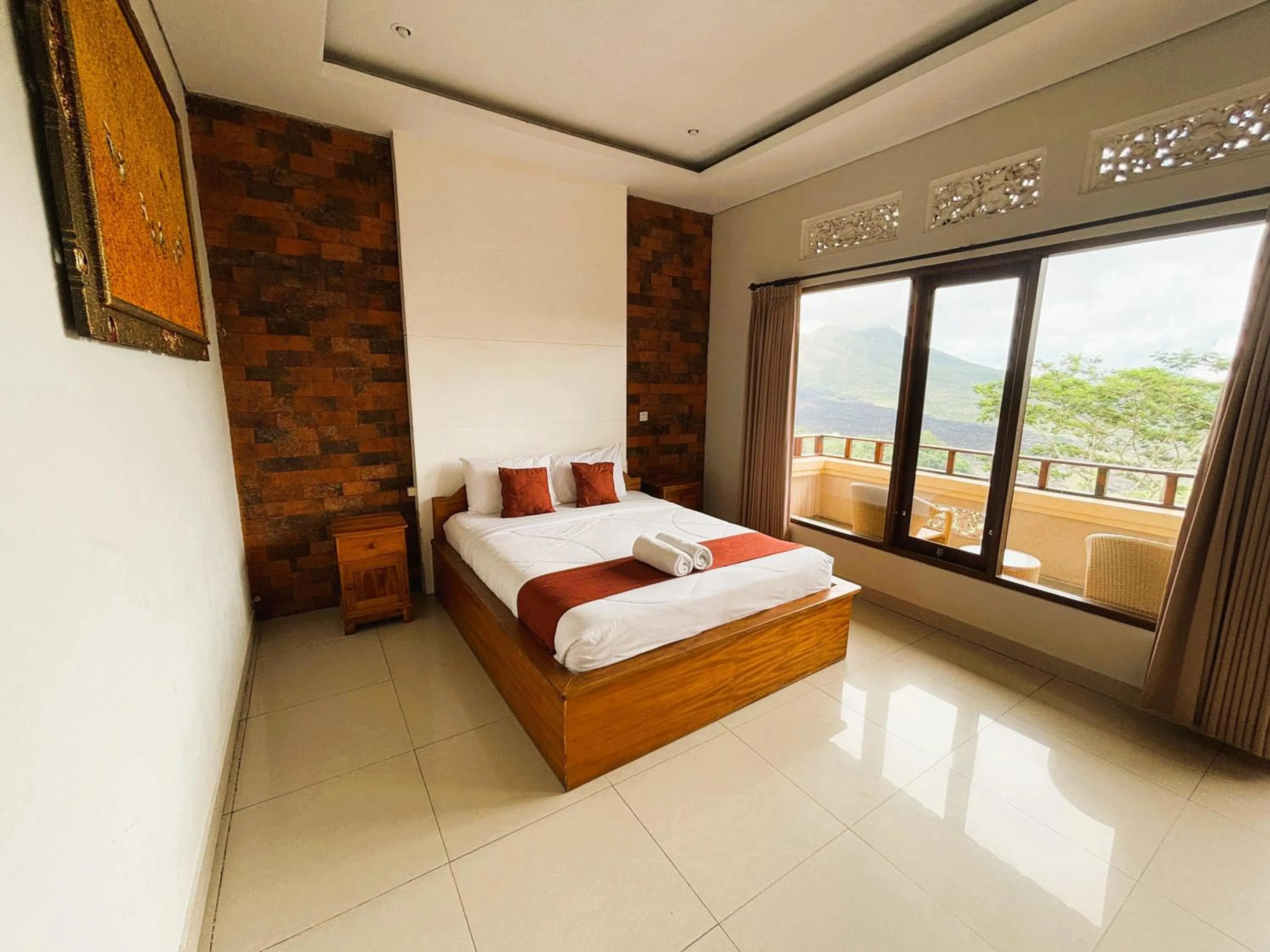 Bed in Caldera Hotel & Restaurant