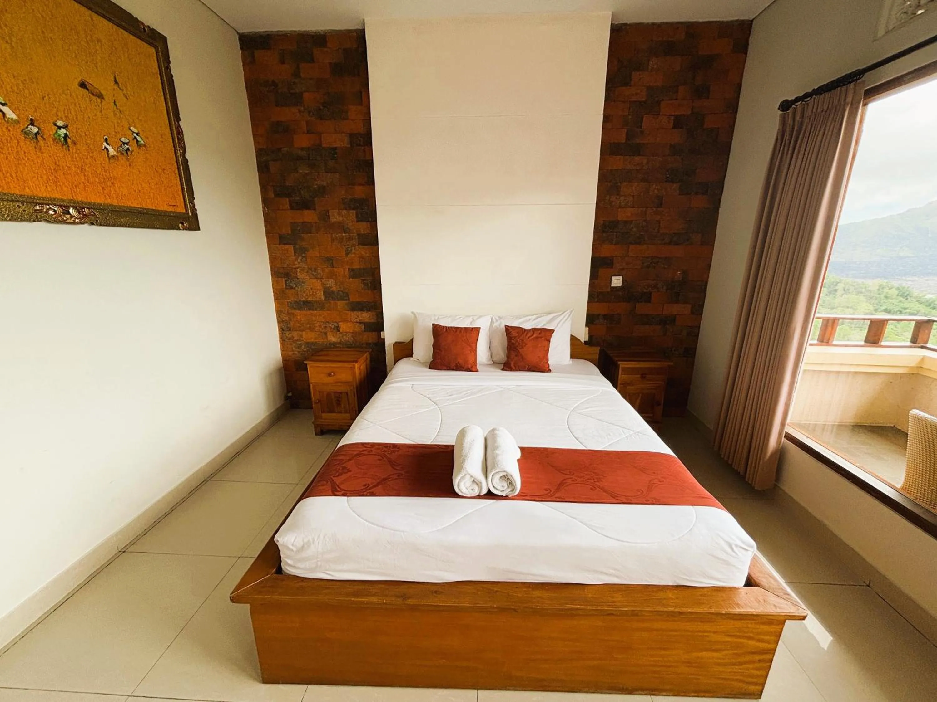 Bed in Caldera Hotel & Restaurant