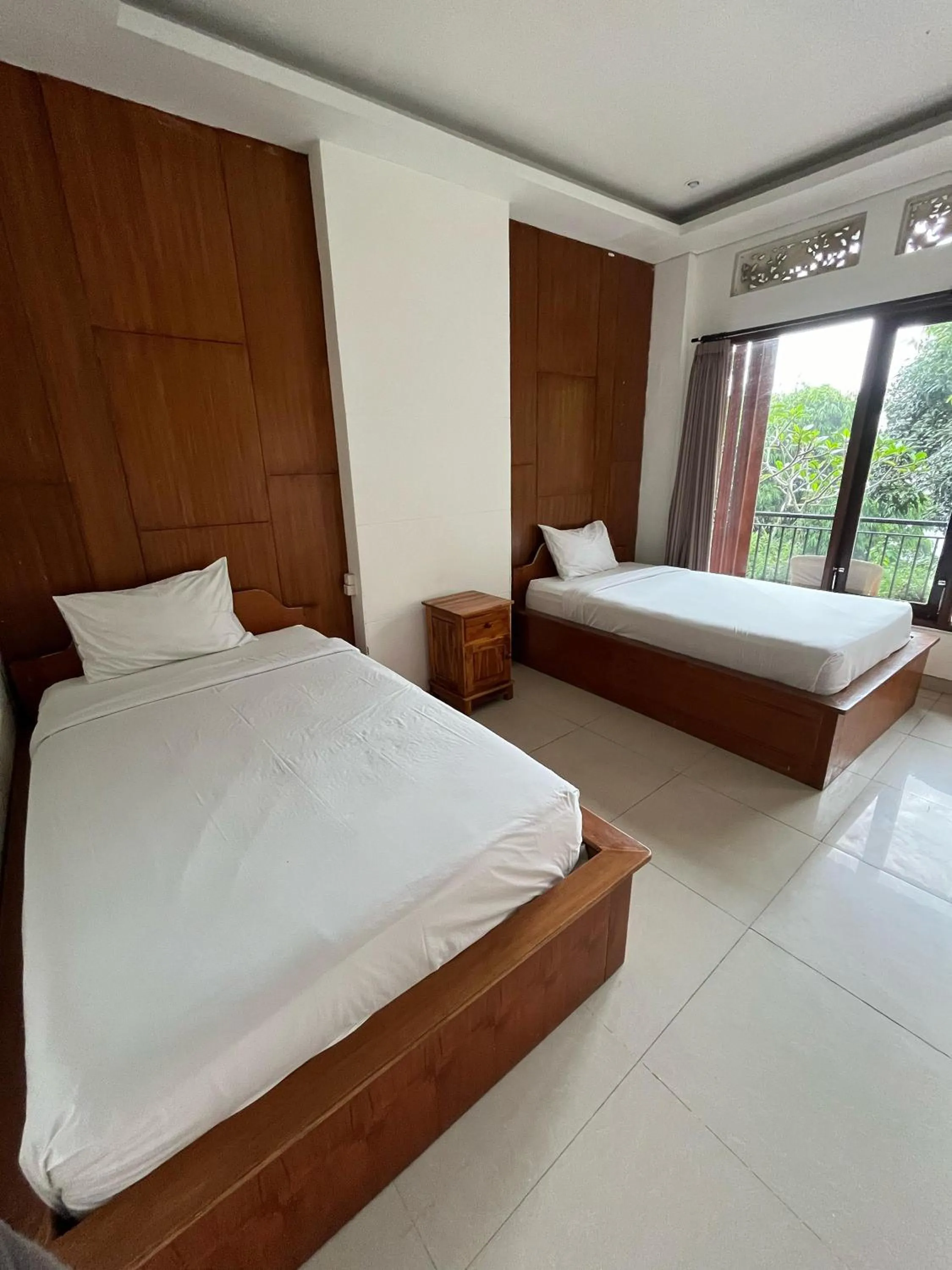 Bed in Caldera Hotel & Restaurant