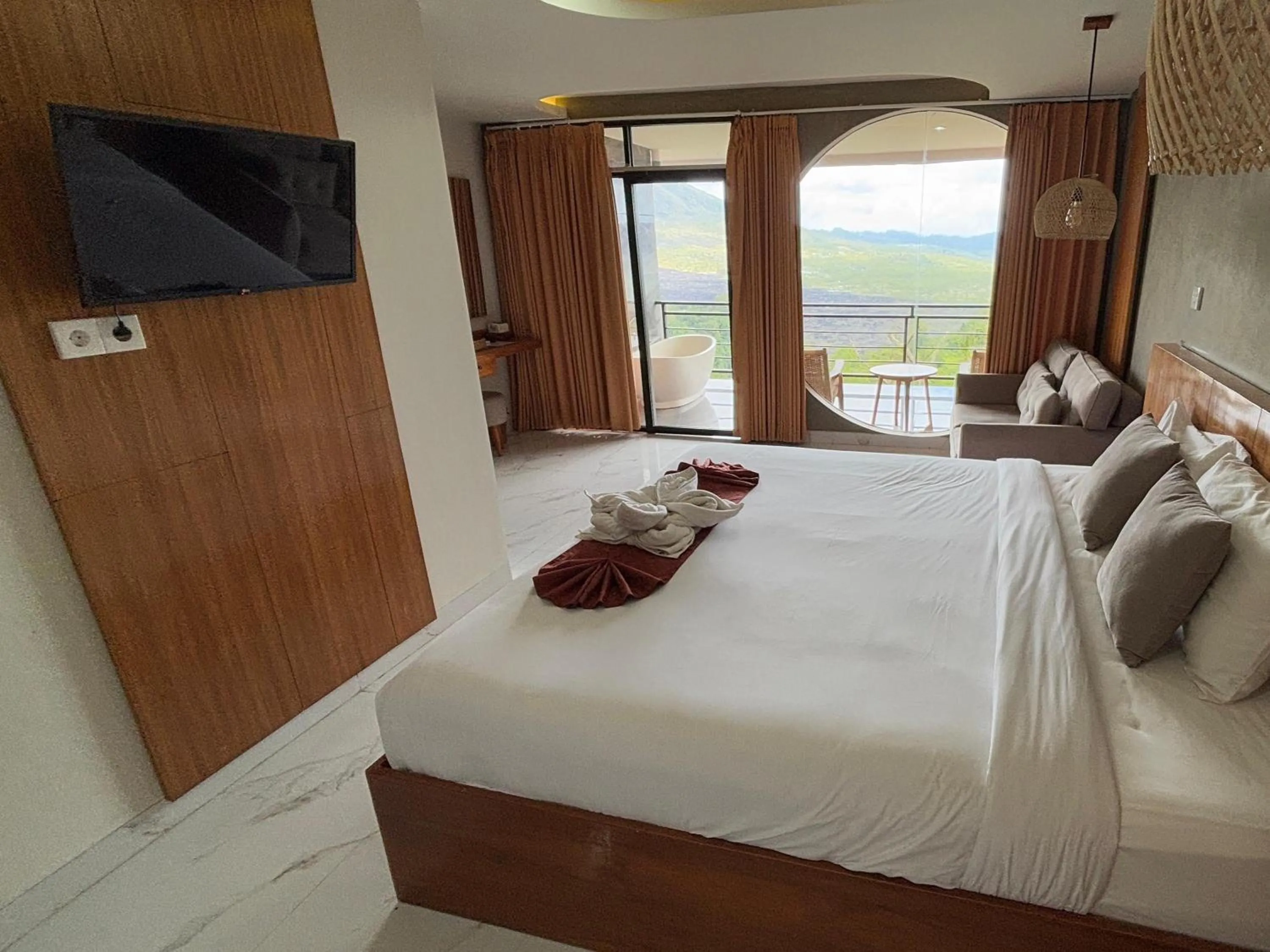 Bed in Caldera Hotel & Restaurant