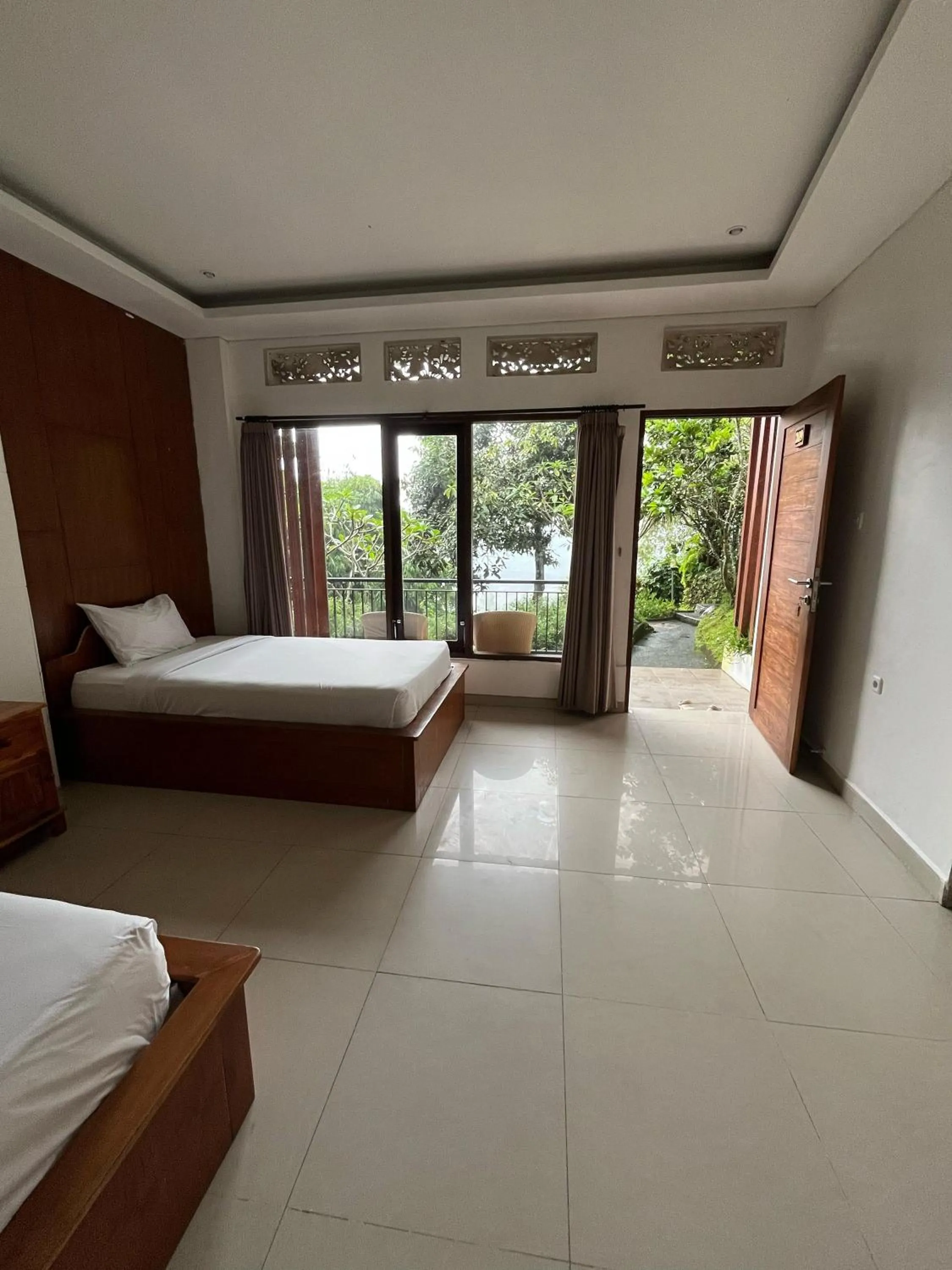 Bed in Caldera Hotel & Restaurant