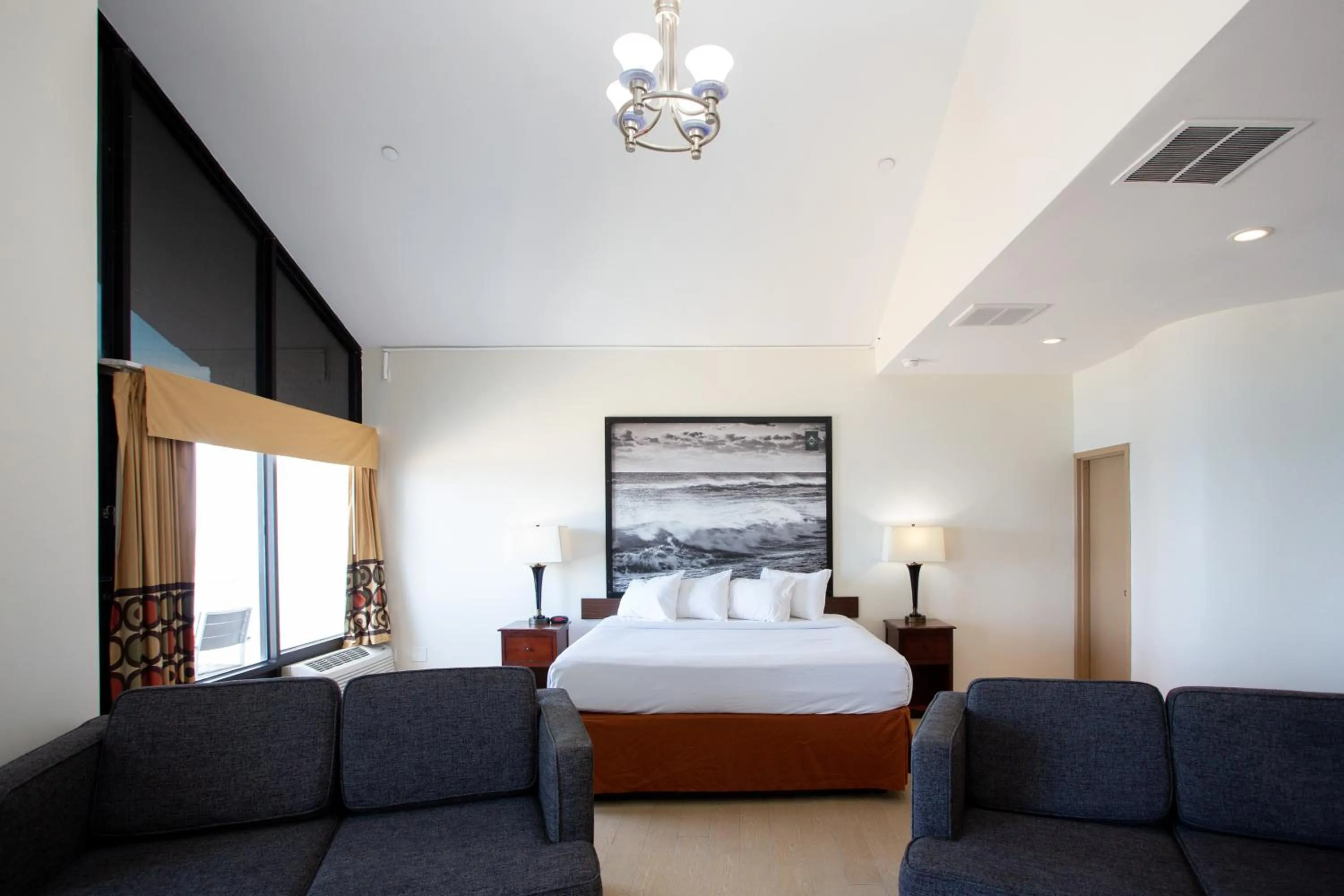 Photo of the whole room, Bed in Super 8 by Wyndham Virginia Beach Oceanfront