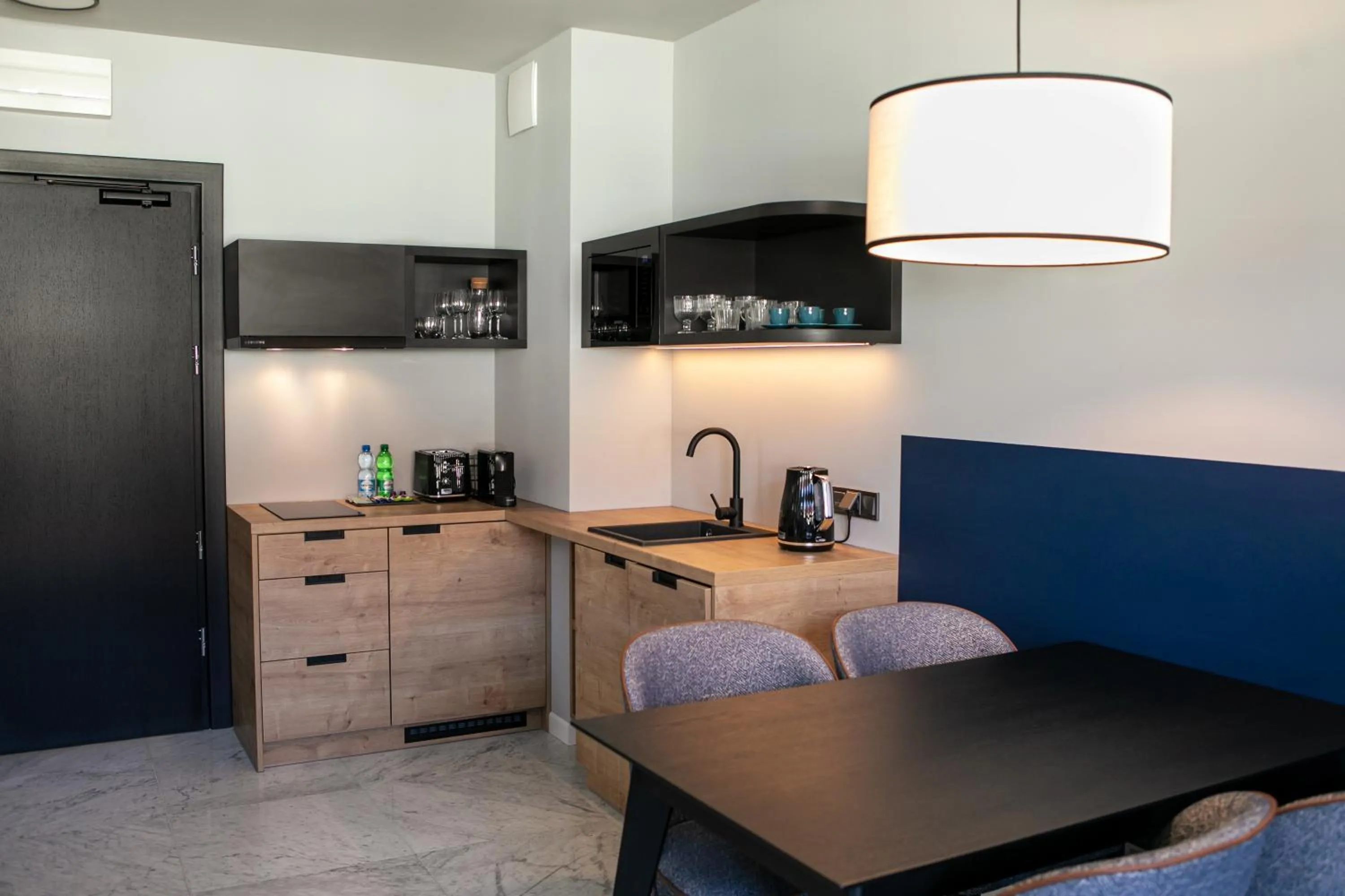 Kitchen or kitchenette in H11 Aparthotel
