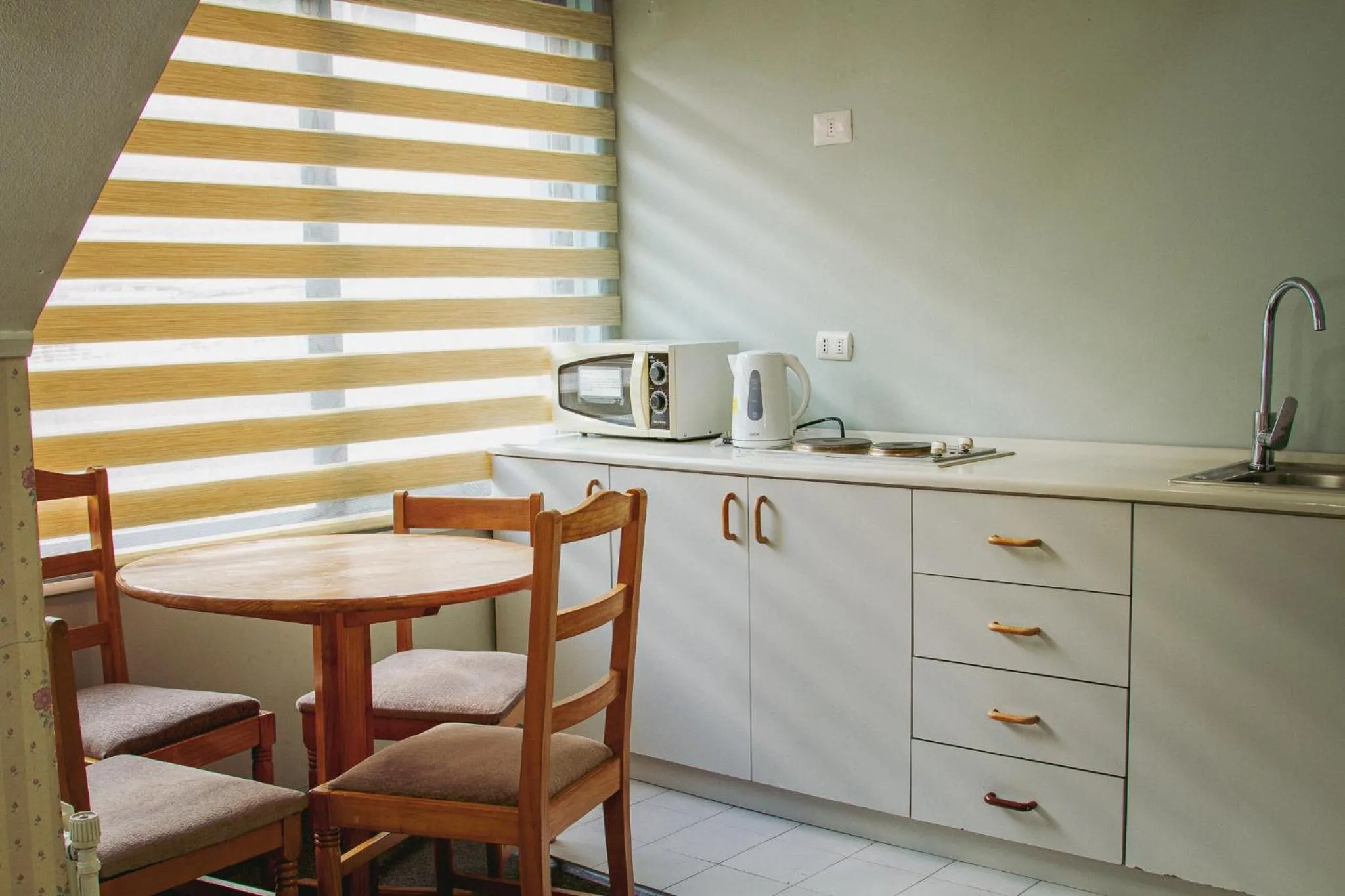 kitchen in Hotel Departamentos del Sur