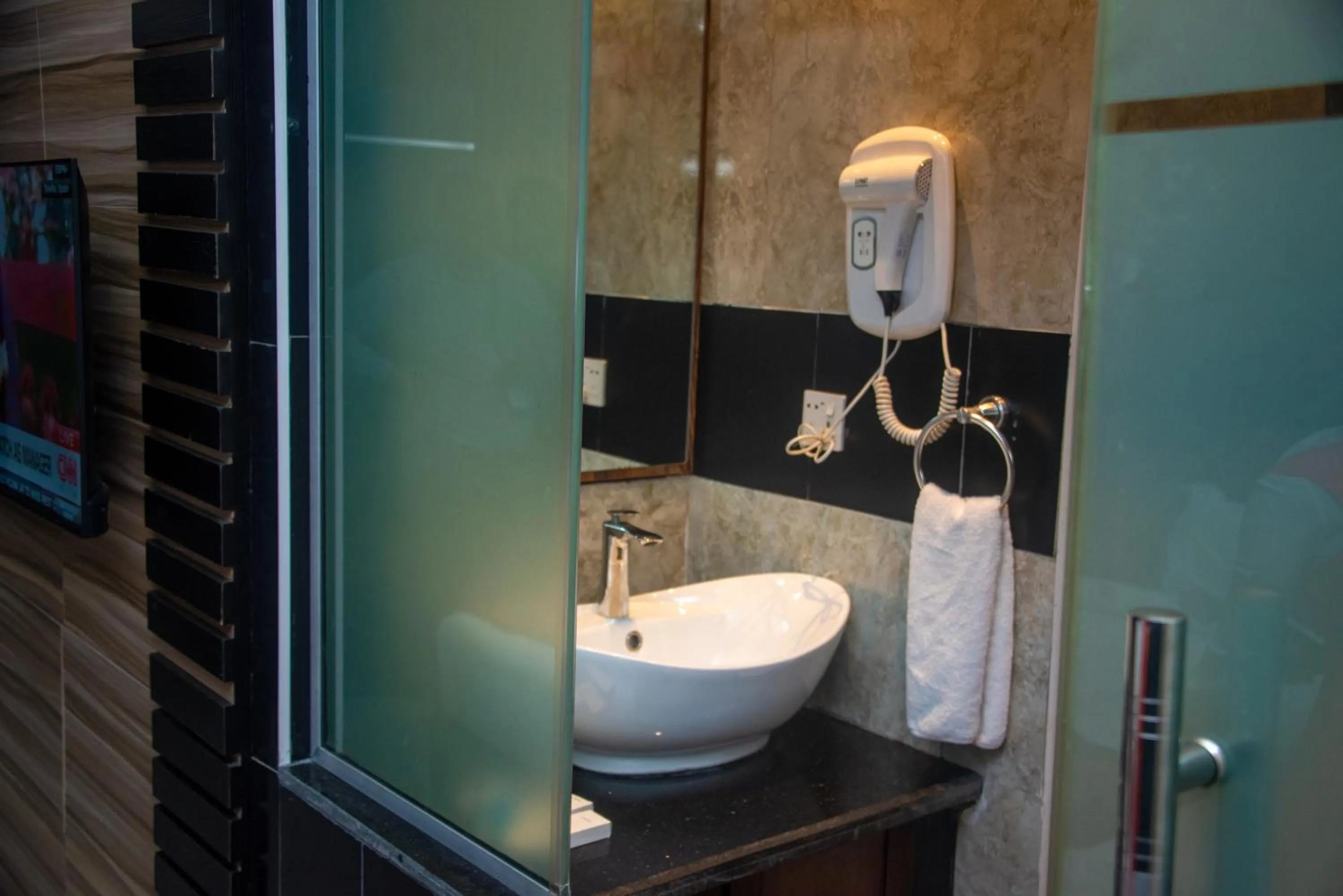 Bathroom in Golden Tulip Garden City Hotel - Rivotel