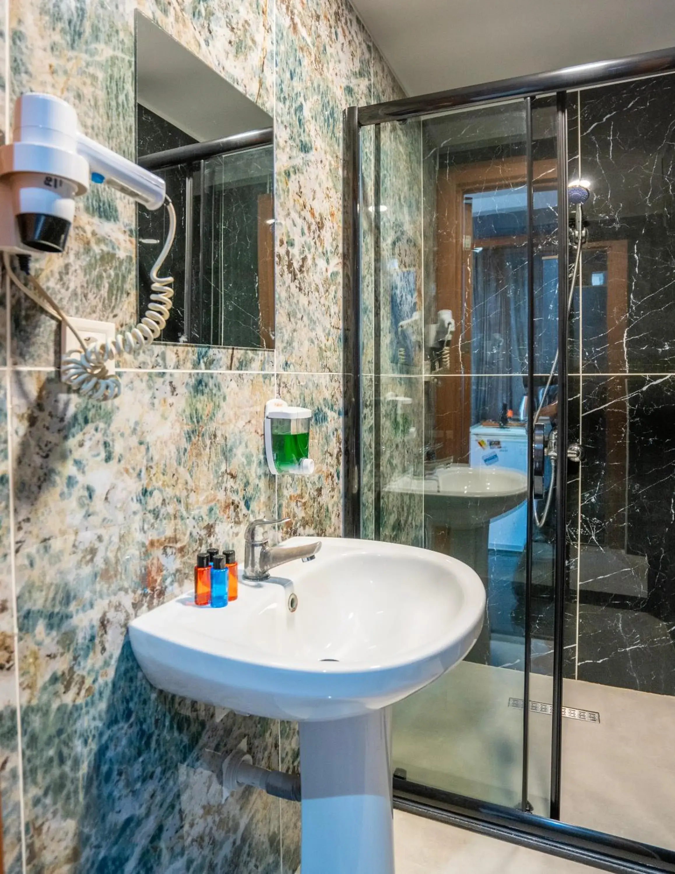 Deluxe Triple Room in Royal Nest Deluxe Triple Room in Royal Nest