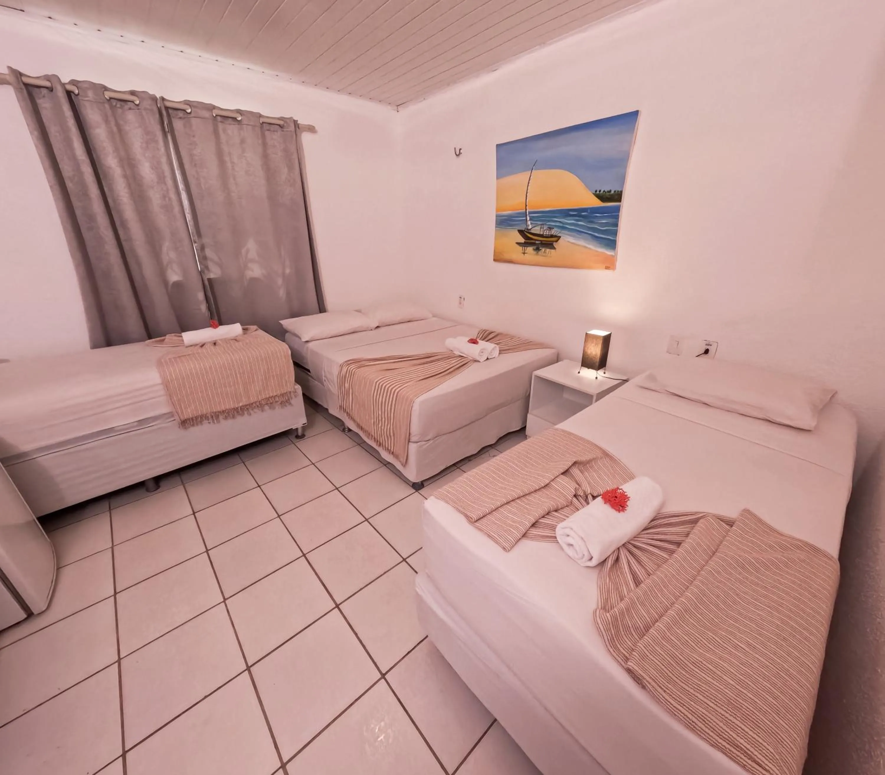 Bed in Pousada Hippopotamus Jeri