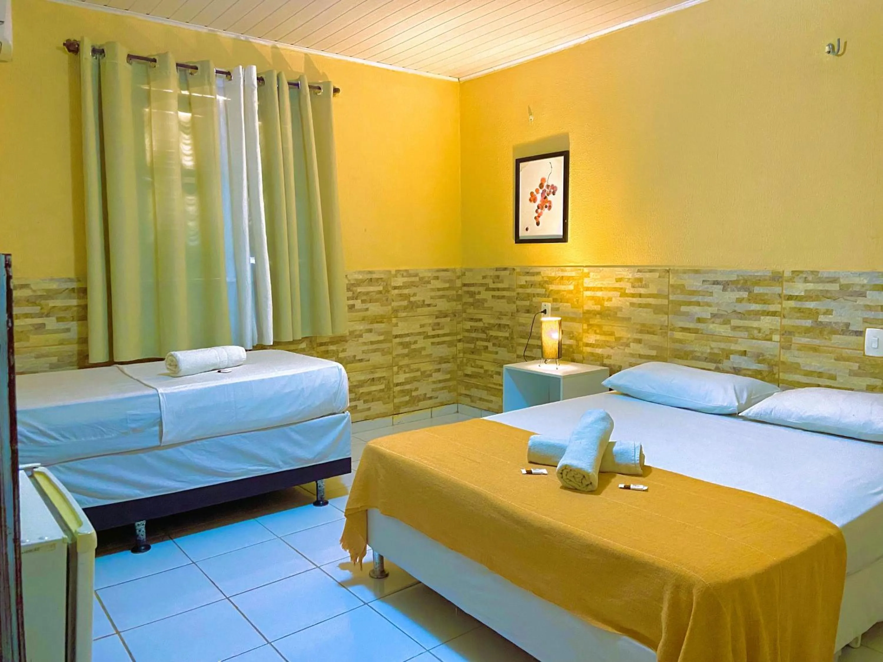 Bed in Pousada Hippopotamus Jeri